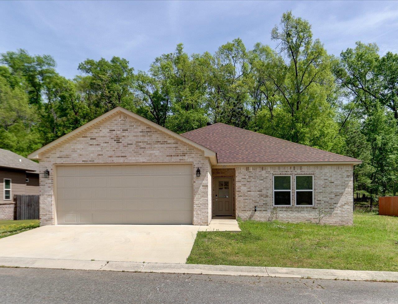 Located just outside city limits in the Lake Hamilton School District, this well-kept 3-bedroom, 2-bath home offers comfortable living in a quiet neighborhood setting. The functional floor plan features welcoming living areas suited for both daily living and casual entertaining.  Community amenities include a neighborhood playground and swimming pool, offering convenient options for outdoor recreation. The home is also a short drive to Lake Hamilton, with access to boating, fishing, dining, and local attractions.  A great opportunity for those seeking a peaceful setting with close proximity to the lake and everyday conveniences.