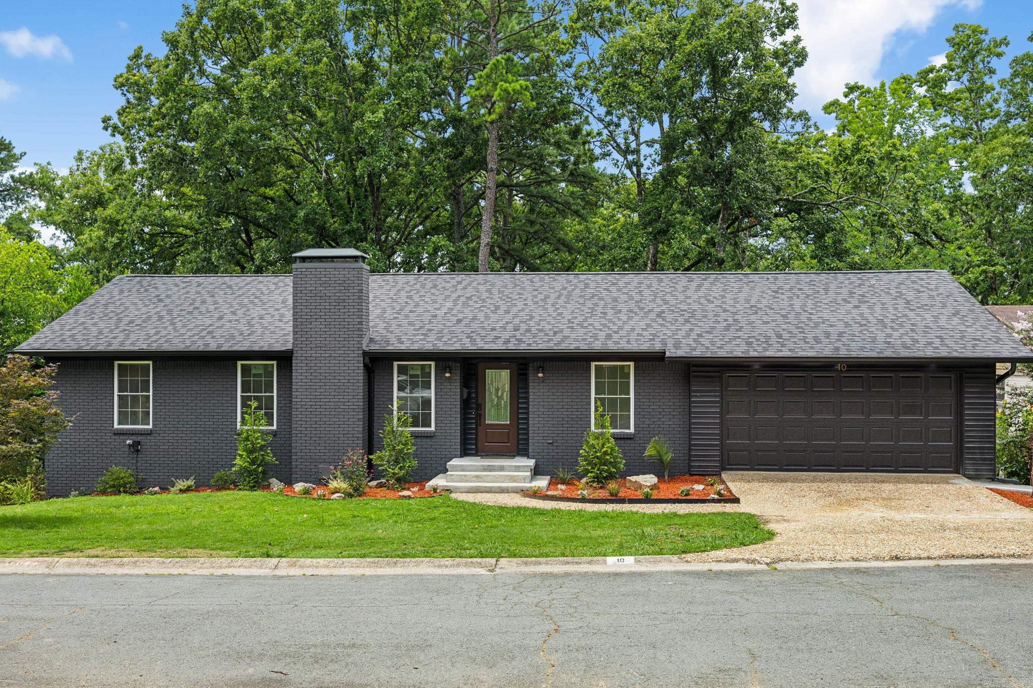 Completely remodeled and thoughtfully reimagined, this stunning home blends smart, modern design with timeless style in a quiet cul-de-sac setting. Offering 4 bedrooms plus a dedicated office that could easily serve as a 5th bedroom. This flexible floor plan also features two spacious living areas each with a fireplace perfect for entertaining or everyday living plus a home gym or bonus room hidden behind a bookcase. The showstopping kitchen boasts all-new cabinetry and appliances, designer finishes, and a hidden walk-in pantry. Major updates include a new roof, new water heater, and beautifully renovated bathrooms throughout. Step outside to an oversized, tree-filled backyard with a brand-new privacy fence, expansive deck, and patio—creating the perfect space to relax, entertain, or play. This home offers the perfect balance of style, function, and quality. A place to settle in, grow in, and call home for years to come!