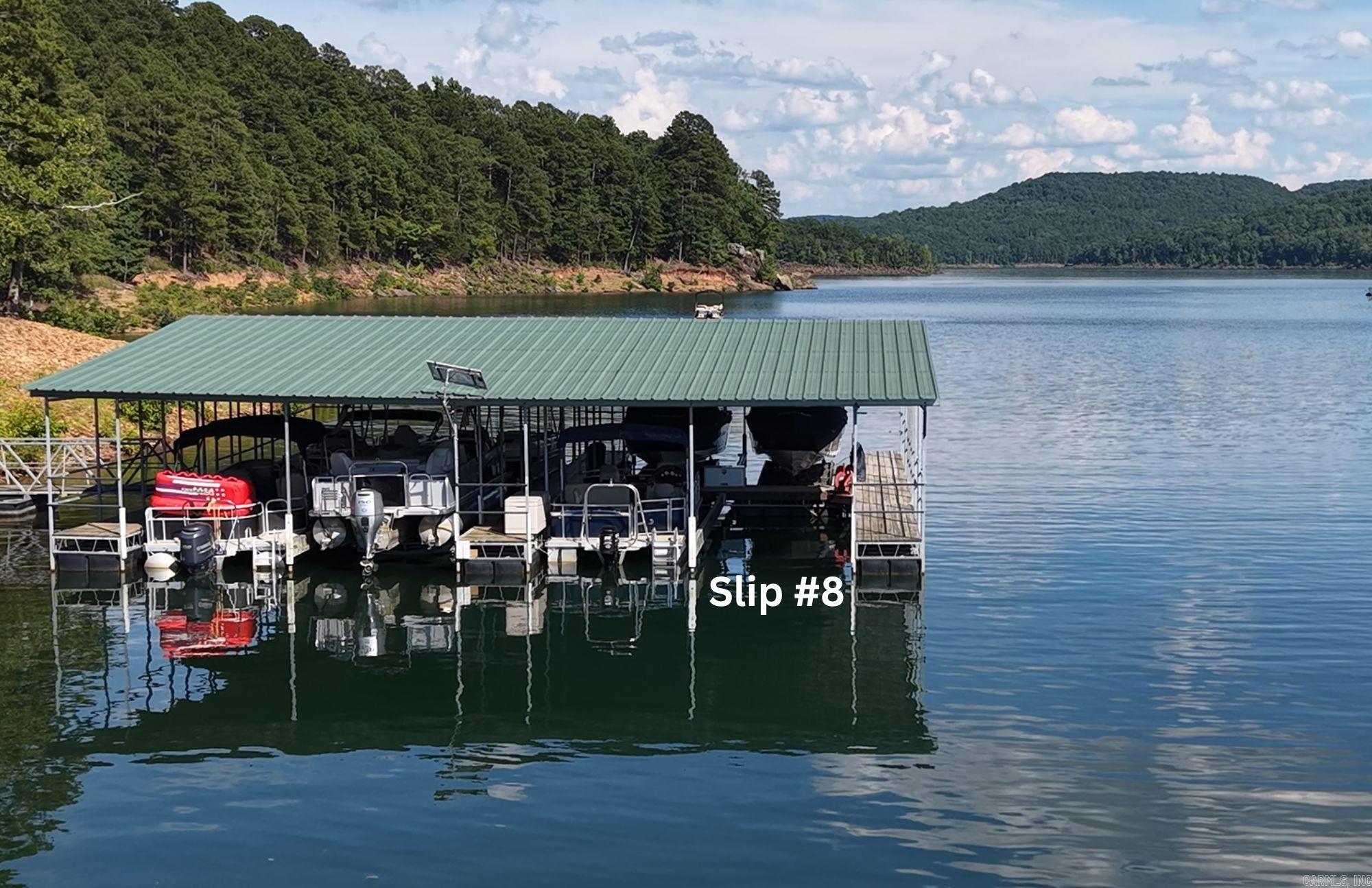 Cobalt Bay Lot with BOAT SLIP in PARTY COVE, aka Thompson Cove.  This lot was perc tested when subdivided and is ready for your new build with 115' of road frontage on Green Creek Trail.  Lot has direct water access from the NE Corner to the Green Creek Cove or cart over to your Boat Slip on Party Cove. Underground utilities available at the front of the lot.