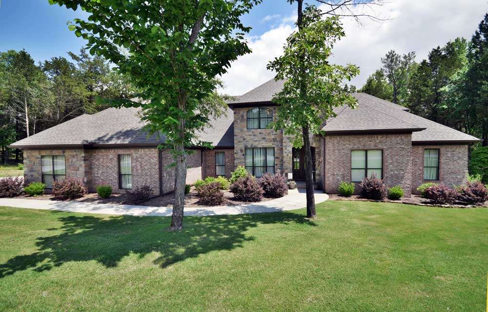 A Gorgeous Setting! In addition to 5 large bedrooms & 4 full baths, this home offers a bonus room & an office, 2 story great room featuring a rock fireplace that peaks at over 14 feet w/built-ins on each side! The kitchen boasts double convection ovens, 5 burner gas range, granite countertops throughout, walk-in pantry plus safe room, HUGE kitchen island, laundry room w/built-in desk, 3 car side loading garage, circulating water heater, sprinkler system, covered deck. See Agent Remarks for more details...
