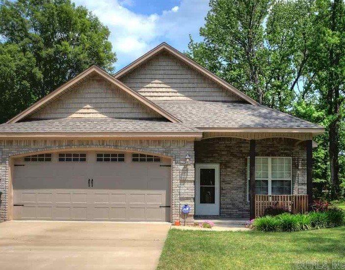 3/2 Split Floor Plan features Hardwood Floors in Living Room w/Fireplace, Kitchen w/Granite Counters, Stainless Steel Appliances-Side by Side Refrigerator, Dishwasher, Stove & Microwave!Tons of Cabinets, Large Island & 2 Pantries! Master Bedroom w/Walk-in Closet, His & Her Sinks, & Walk-in Shower. 2nd & 3rd Bdrm separate w/Hollywood Bath. Laundry Room, 2-car Garage, Front Porch, Back Patio and Fenced Backyard