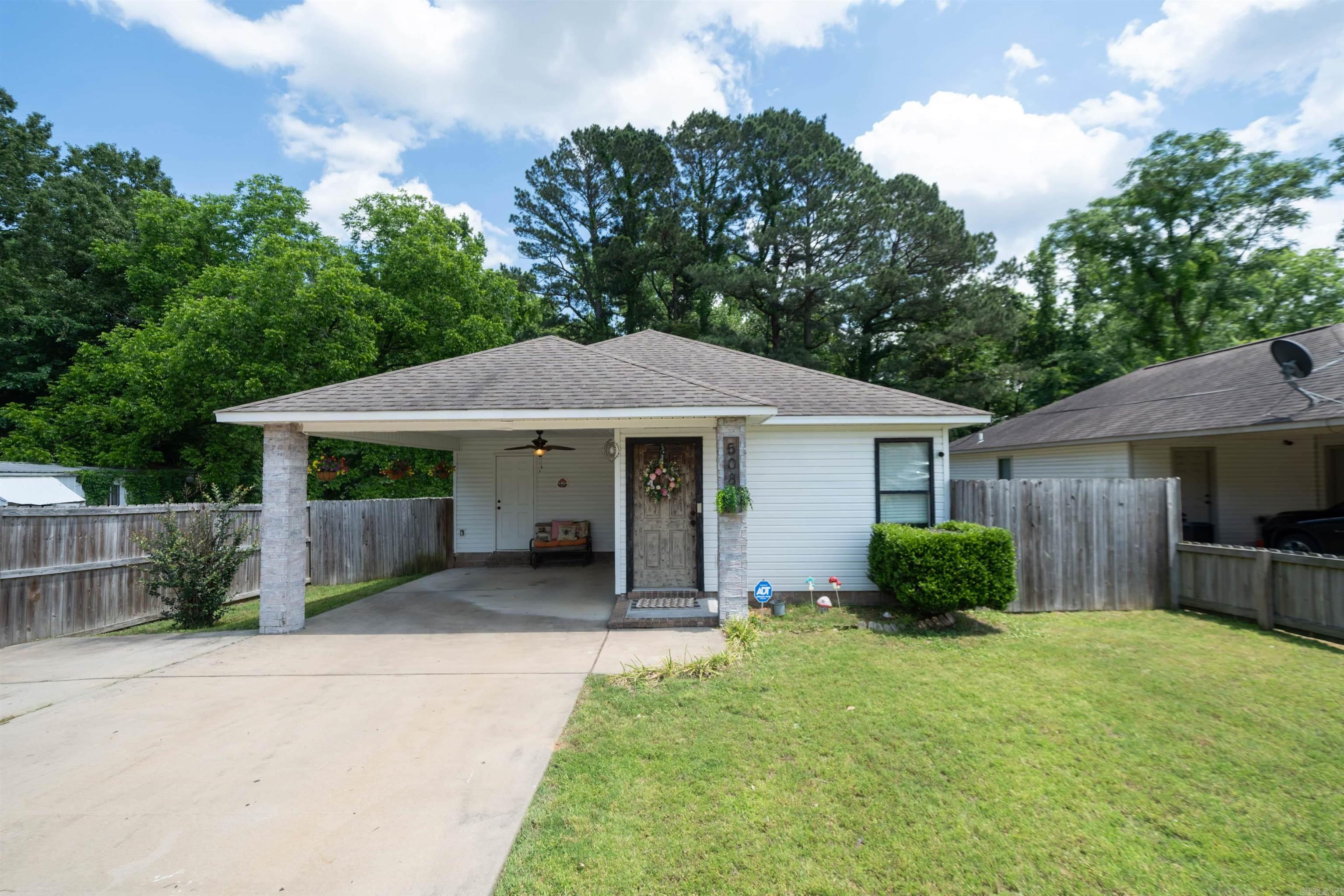 Don't miss this adorable home located within walking distance of Sheridan School District schools. This home features 3 bedrooms, 2 bathrooms, with 1065 square feet of living space. In the kitchen you'll find room for an eat in kitchen area as well as breakfast bar for dining. Stainless steel appliances in the kitchen as well. There is stained concrete floors throughout most of the home with carpet in the master bedroom. The backyard is fully fenced in with a wood fence along with 2 storage sheds for all your outdoor things! In the back you'll also find covered patio area form the right side of the home all the way to the back so plenty of room for fresh air and relaxing! Don't let this home slip through your fingers, call today!