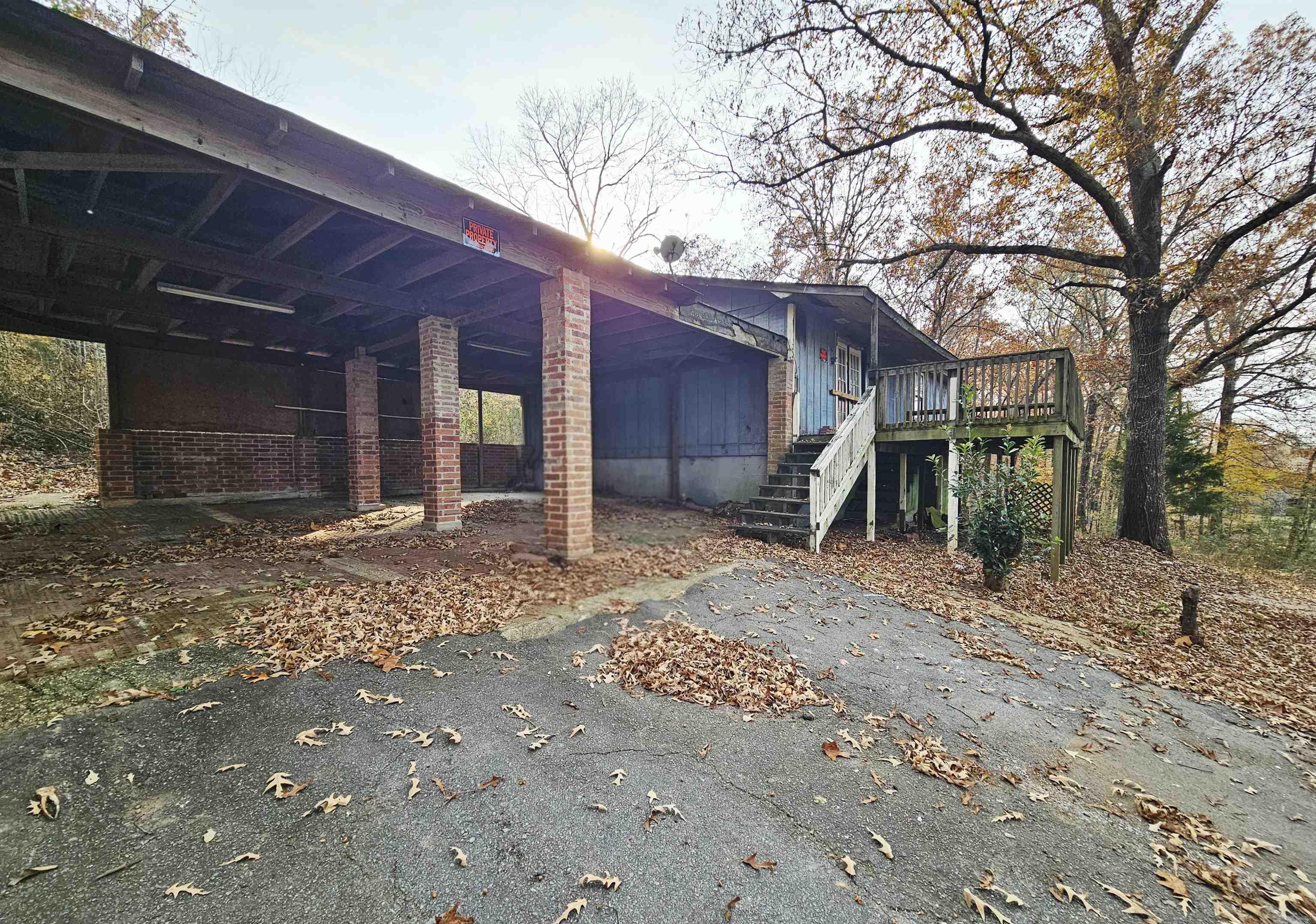 Great investment opportunity on 0.81 acres in Jacksonville, AR! This property offers strong potential for investors, flippers, or buyers looking for their next value-add project. Private wooded setting with a long driveway, basement level, covered carport, and plenty of room to reimagine the space.