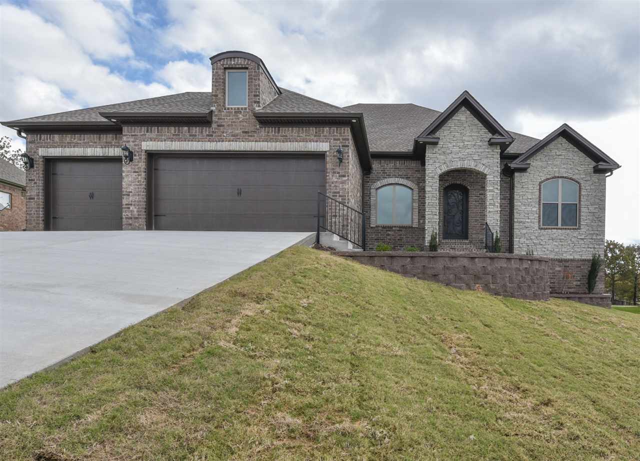 Brand NEW construction! Grand open space w/12' ceilings & 8' doors. Builder spent extra $5K on foundation walls to ensure lifelong integrity of this home! Lots of hardwoods & designer finishes. Split bedroom for privacy, over-sized closets, master bath/closet is a spacious, must have area! Hardwood in central living area & master bedroom. Space over the 3-car garage could provide added 400 plus sf if completed. Oversized backyard would accommodate Olympic size pool! Hurry, this quality home won't last long.