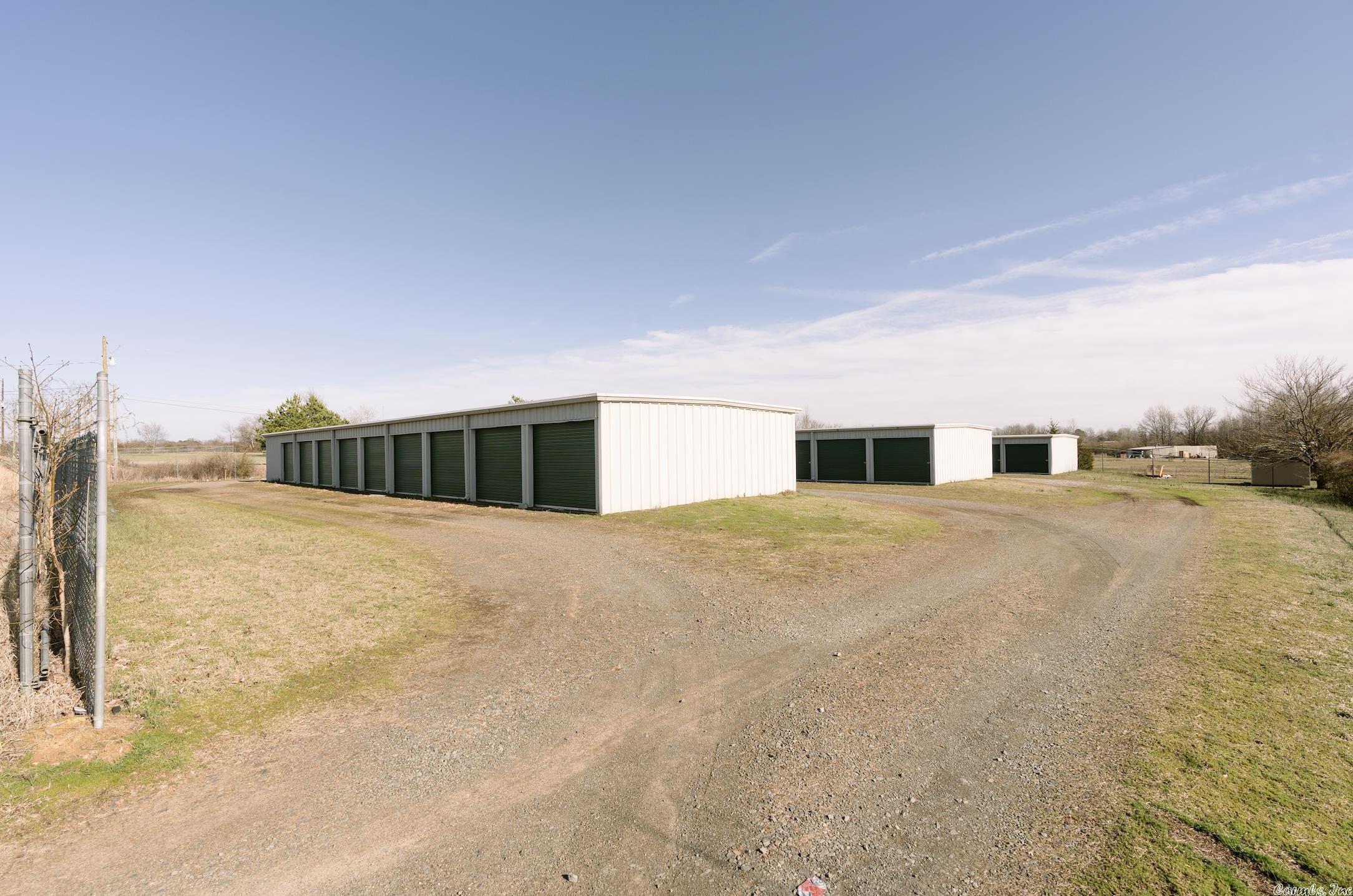 51 unit storage facility located just off of Highway 25N in Guy. Units range from 5x10 up to 10x25. All 3 buildings are on slabs with all metal exterior. Partially fenced in with gate and Arlo security camera that does convey.