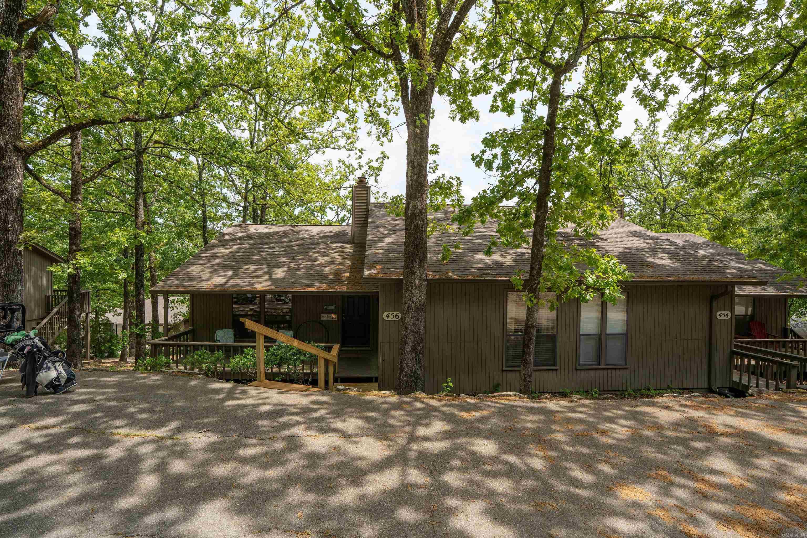 Look no further for your home away from home!! This beautiful condo on Eden Isle in Heber Springs has all the  amenities at your finger tips with the Red Apple inn Resort within walking distance.  The inn features a wonderful bar and restaurant for exquisite food and drinks, swimming pools, work out center, tennis courts and the well known Red Apple golf course and don't forget the marina where you can keep your boat or rent one for the day.  This lovely condo is spacious with wood like tile floors, vaulted ceiling,comes fully furnished and is move in ready!! The back deck is perfect for relaxing with your favorite beverage while gazing at the golf course or watching the deer in the evening!! Call today and get your piece of heaven at Eden Isle!!!