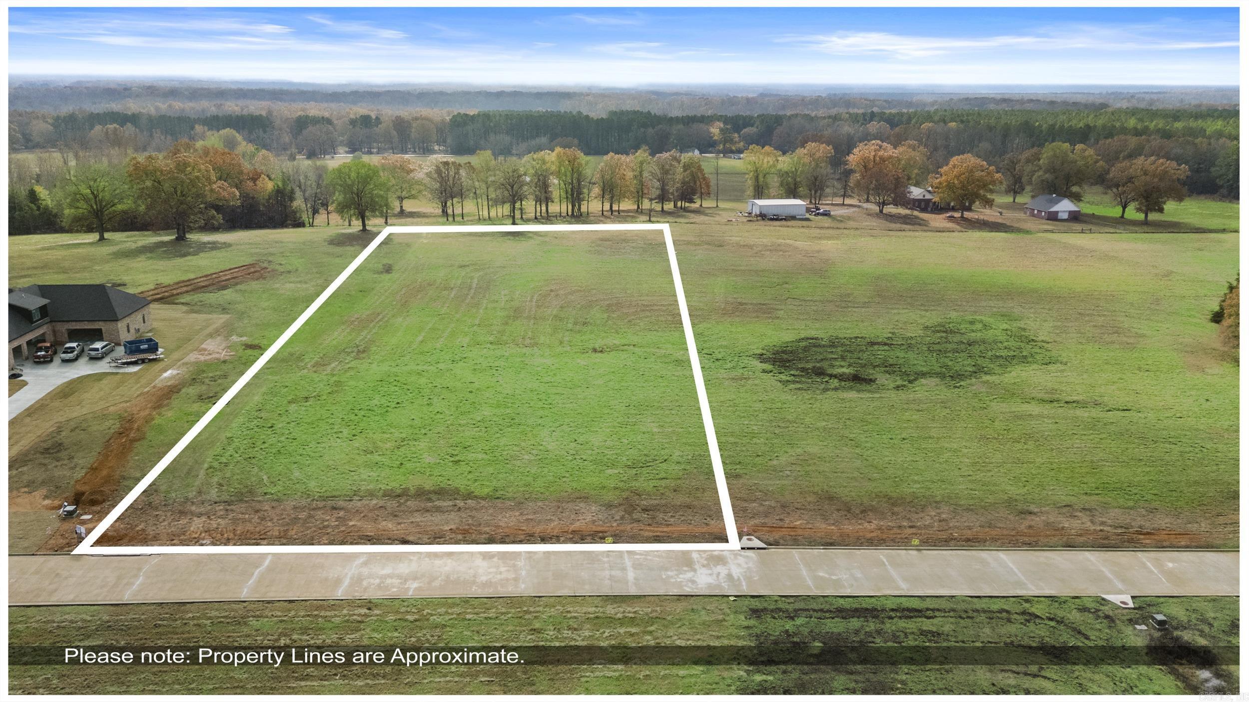 Discover the perfect setting for your dream home on this beautiful 3 acre lot located in one of Searcy's most desirable new neighborhoods. Enjoy peaceful country living just minutes from town in this gated community with exceptional views! New builds are subject to covenants (agents see assoc docs) and a minimum of 2800 sq ft home. Call today for more information!