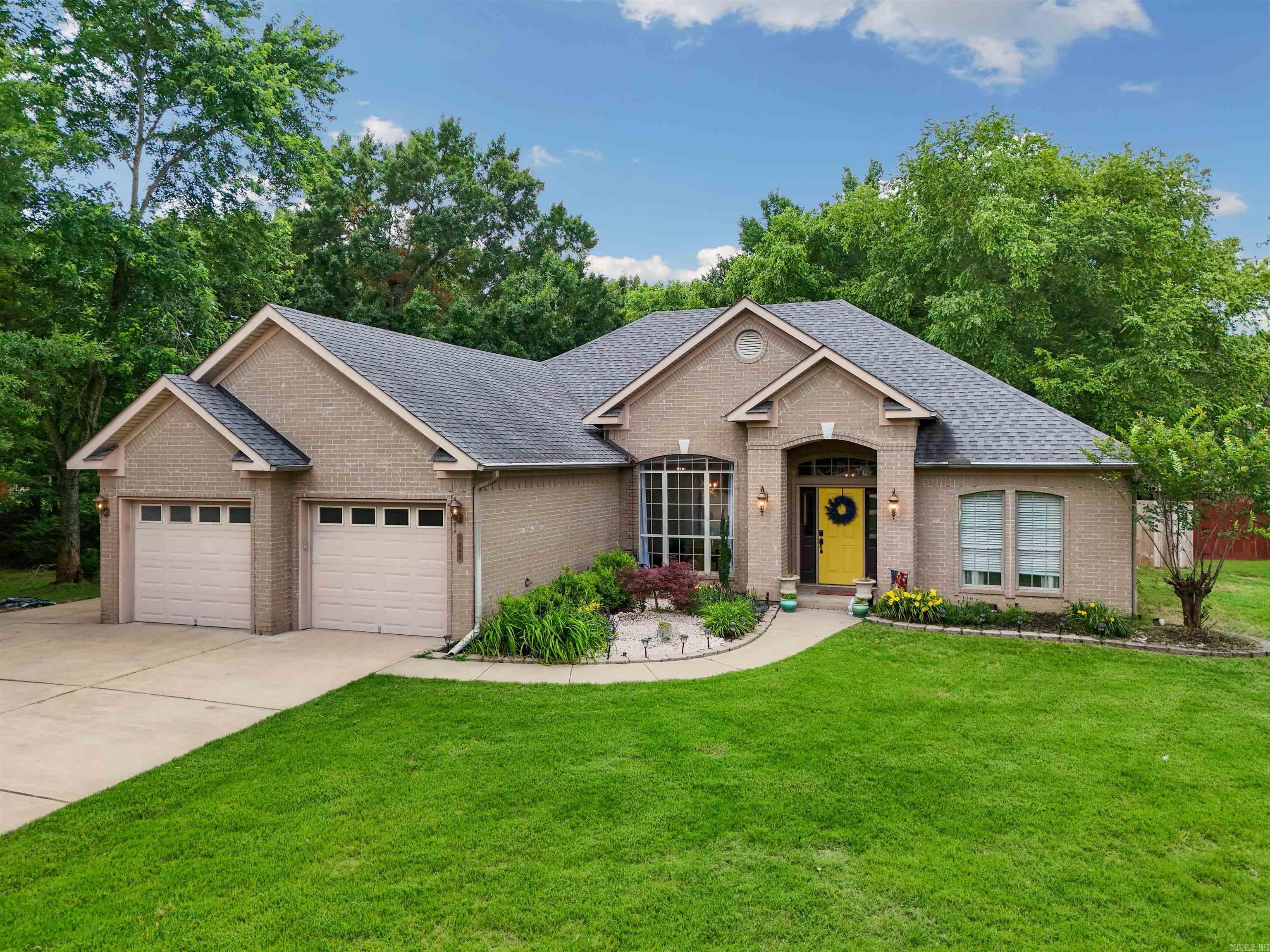 Beautiful home with all the amenities....formal dining,  updated kitchen with gas range,  updated lighting,  new countertops in bathrooms,  heated and cooled sunroom that overlooks the pool.  Detached 13 x 13, heated, and cooled home office along with a new wood privacy fence!   You never have to leave this peaceful retreat! Seller will accept offers until Wednesday, June 3, at 12:00 pm noon.  Please submit highest and best.