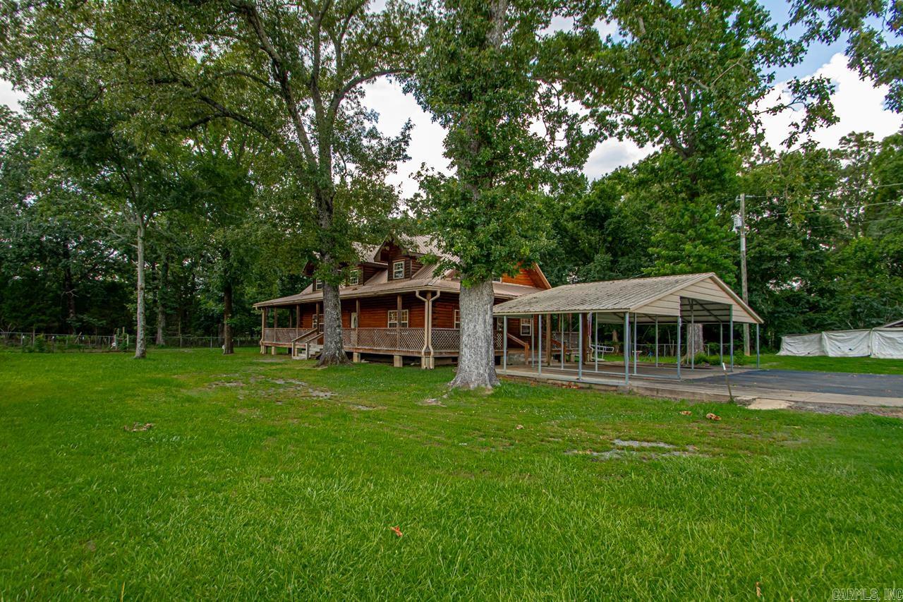 Come visit this Beautiful Log Home on almost 2 acres in the Olmstead Community in North Pulaski. Home located in a rural area surrounded by farmland. 5 Bedrooms, 2 Full Baths, plus a Half Bath just right for family living.  The wrap around porch makes this awesome property so special!!