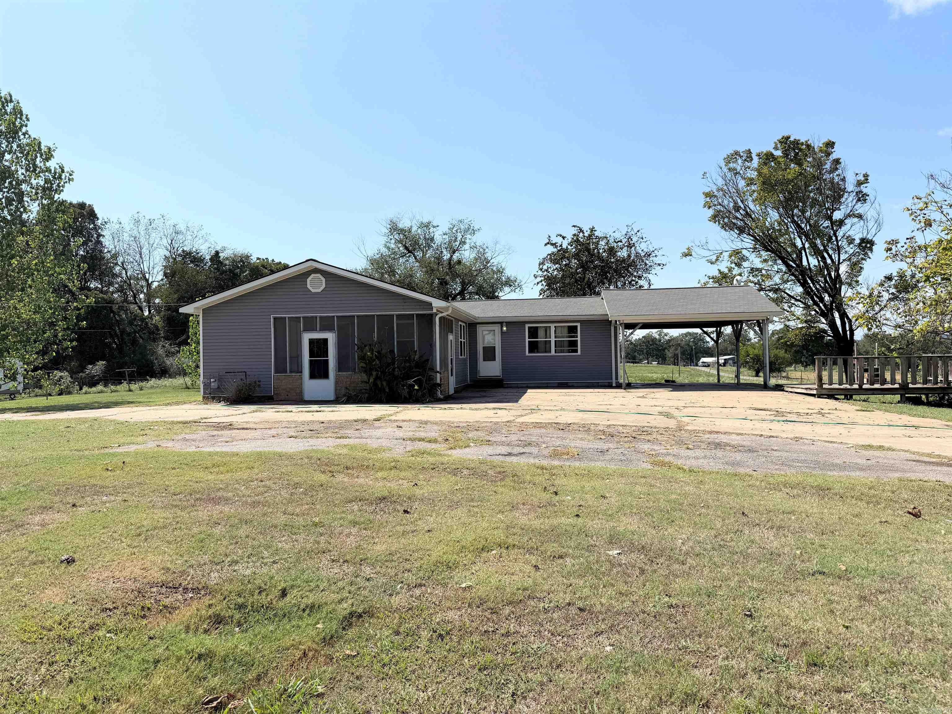 Super cute 3 bedroom, 1 bath home sitting on almost an acre (.99)! This charming property features a spacious kitchen, large living room, and a screened-in sun porch perfect for relaxing evenings. Outside, you’ll find a generous lot with a shop and plenty of room to enjoy the beautiful setting. Recent updates include a brand-new CH&A unit and a newer roof for peace of mind. This home is on the Coal Hill/Altus line. Don’t miss your chance, schedule your showing today before it’s gone!