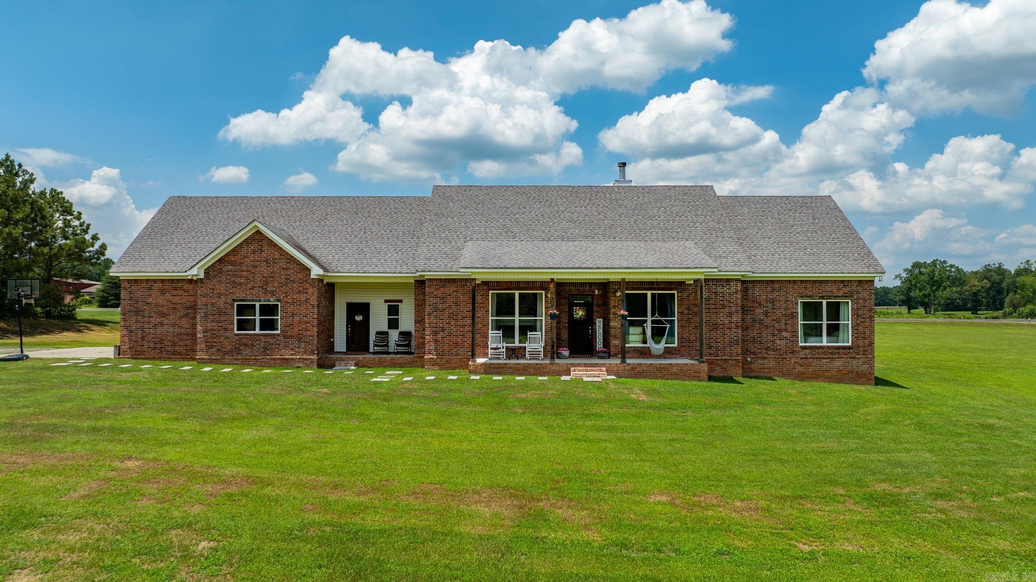 Rare opportunity to own a custom home with direct runway access in the desirable Arkavalley Airpark! Situated on 5.33 acres, this well-maintained home offers 2,904 heated and cooled sq. ft. with 5 bedrooms, 3 bathrooms, and a versatile bonus room that could serve as the 5th bedroom, game room, or office. The open-concept floor plan features 10’ ceilings, polished concrete floors, a wood-burning fireplace, a spacious kitchen with a large island and walk-in pantry, and a private primary suite with an oversized walk-in closet. Enjoy peaceful mornings on the front or back porch while watching local wildlife. Additional features include an 866 sq. ft. 3-car garage, fiber internet, RV hookup, storm shelter, walk-in attic storage, and Greenbrier Schools. Built in 2018 with updates including a finished bonus room (2025), second HVAC (2023), gas water heater (2024), and gas range (2024). A unique property offering space, privacy, and aviation living! You wont want to miss this one.