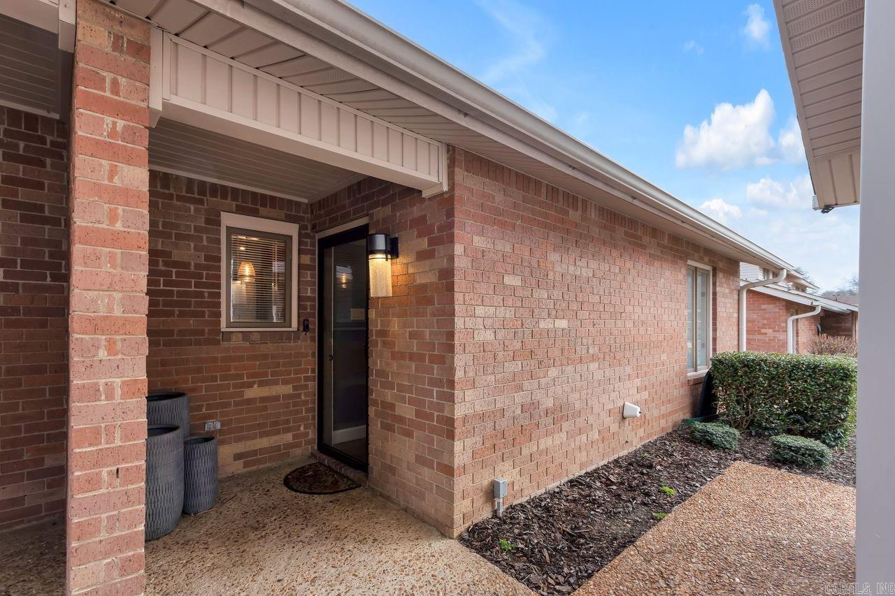 Welcome Greenbriar Villages newest available condo located at 2733 Greenbriar Dr Unit B in Jonesboro, AR! This well maintained condo features 2 bedrooms and 1 bathroom with updated luxury vinyl plank flooring in the main living areas, updated appliances, and fresh paint throughout. The entryway opens into a spacious living area with vaulted ceilings, a wood burning fireplace, and French doors leading to a private back patio. The kitchen is just off the main living space and offers GE appliances, updated lighting, and ample cabinet storage. Both bedrooms are generously sized and include double door closets. Residents also enjoy access to the community in ground pool. This condo offers comfortable living in a convenient location and is ready for its next owner!