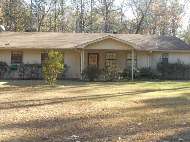 Super nice move in ready 3 BR 3 bath home. Rural Residential. Carport w/utility bldg on end (2 sep. rooms). Metal storage bldg backyard. Larger storage bldg use as shop or whatever. White kit. cabinets w/black electric smooth surface stove on counter top where it is used as eat-at-bar. Black built in oven. Wooden deck on back of house beginning at carport. C&L electric & Hwy. 63 water. Built 1999. 1560 sq. ft. Taxes $673.38 w/homestead tax credit. NEW ROOF OCT 2019.