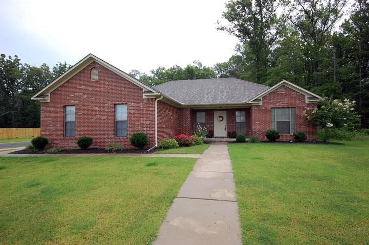 QUALIFIES for 100% Financing! Perfect family home in a great subdivision that is conveniently located near I40. This home is in mint condition and sits on a large, corner lot at the end of the road. Trees line the back of the property offering plenty of privacy. Tray ceilings, stained concrete floors, open and split floor plan, as well as nice landscaped yard are just a few of the things that make this home a great one to add to your list to see!