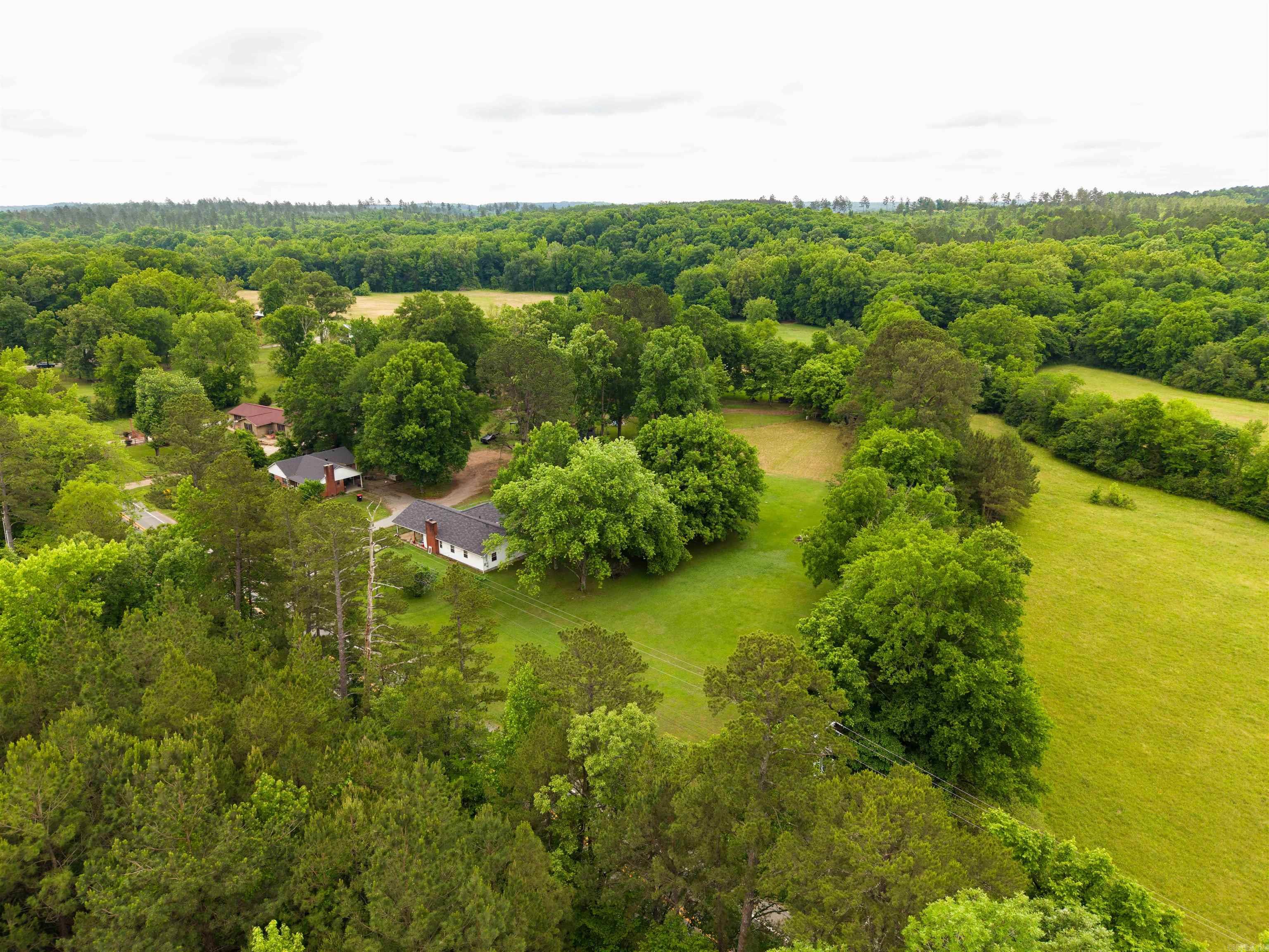 This cute benton home sitting on 2 acres has 3 bedrooms, and 2 baths with PLENTY of room to grow! Enjoy your little piece of paradise in but still be minutes from town. Showings are by appointments only and will start on June 1. Contact today for more information!