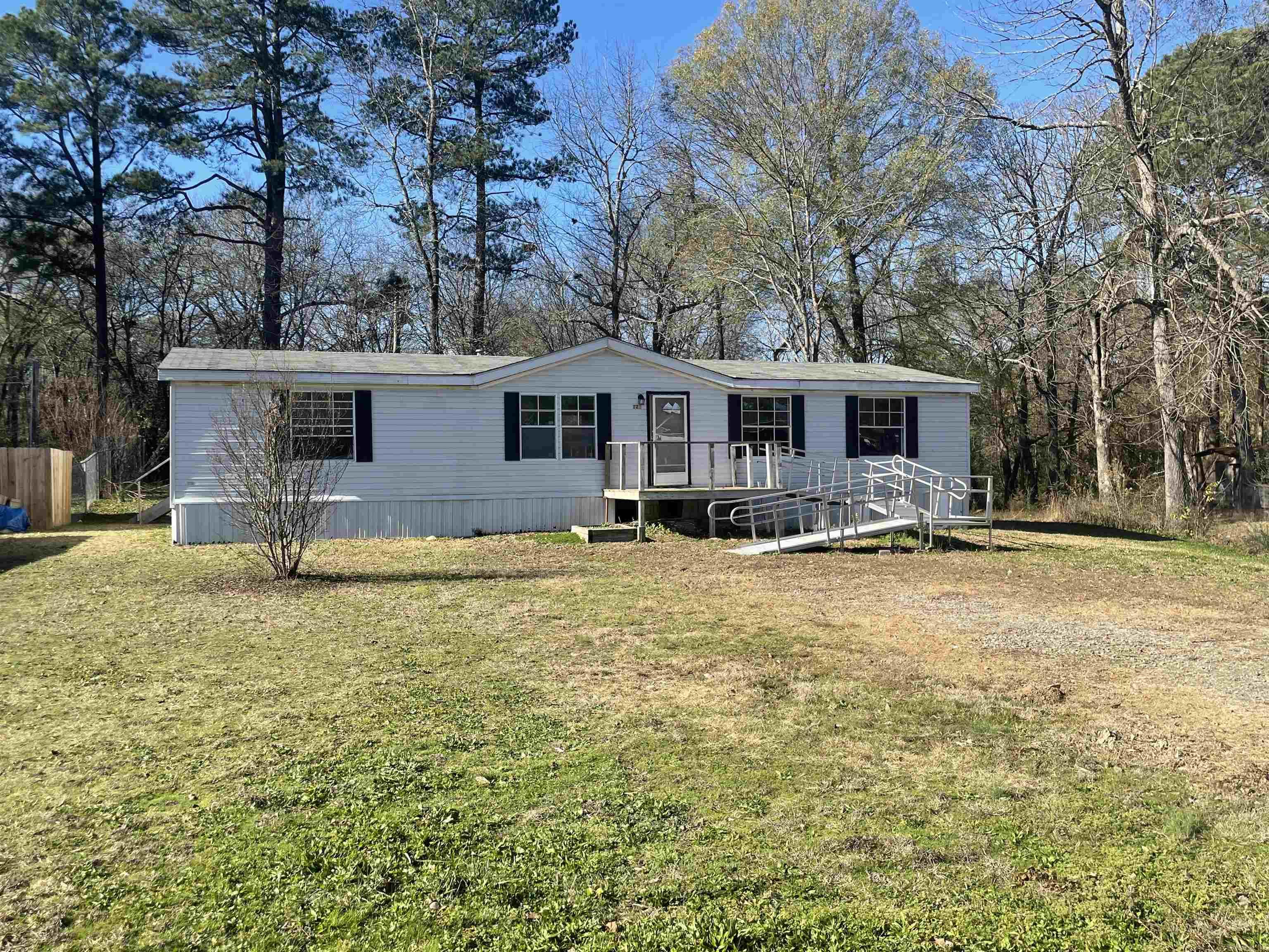 Affordable living in Hot Springs! This 3-bedroom, 2-bath mobile home is located just minutes from downtown, Oaklawn, and the lakes, this home sits in a quiet area and has plenty of potential for the right buyer. Inside, you’ll find a functional layout with a modest kitchen, living area, and three bedrooms. Whether you’re a first time home buyer or an investor, this is a great opportunity.  HUD owned property, sold as-is. Agents see remarks.
