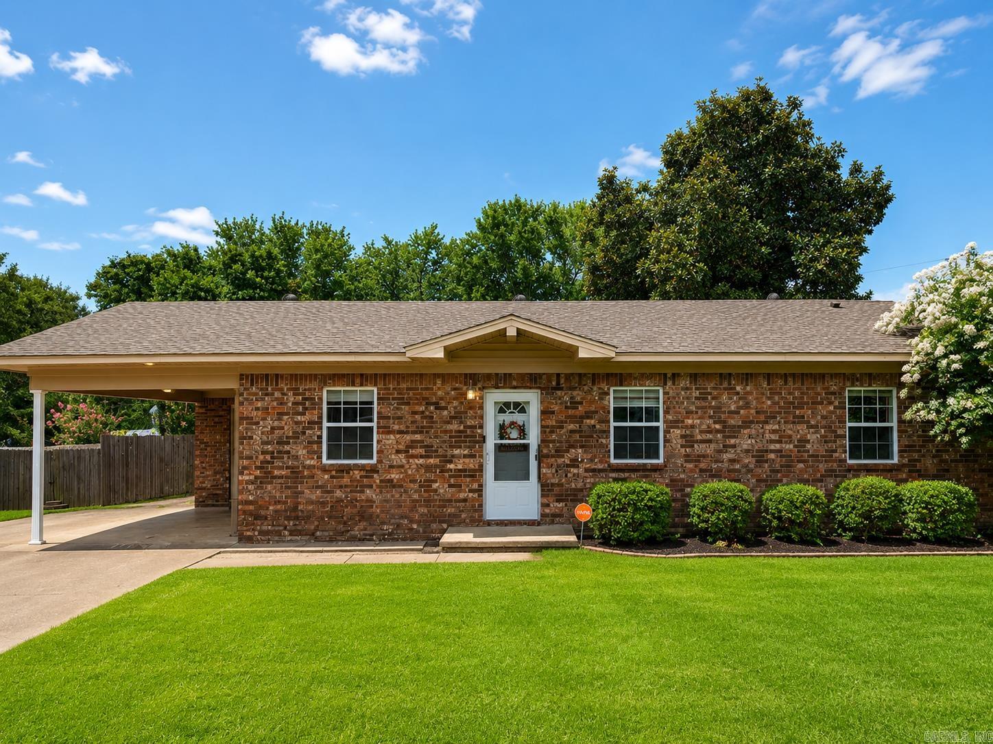 Looking for a Great house in a Great location at a Great price?  Look no more... This 3 bed 1 full bath all Brick home is awaiting its next owners.  As you walk in to the front door, you are welcomed with an open concept having dining, kitchen and living area blended with a movable island for entertaining guests or prep area.  All bedrooms have large double door closets and centrally located to the updated bathroom... House is well built with 2x6 walls so is extra insulated to keep cooling costs down!  Fully fenced HUGE back yard with a beautiful Magnolia tree that will make your neighbors jealous!  There is also a nice work shed out back with a roll up door for all your toys and storage. The covered carport also has a storage room and houses the hot water heater.  This home includes a  security system with cameras that will convey with the house. You can buy this for less than you can rent!!! Call your agent and book your showing today!