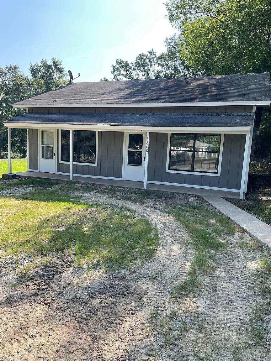 This is charming little home in a rural setting. This single family residence in Traskwood is just about 7 miles from I-30, Exit 114 (Haskell). This home was recently updated (about two years ago) with fresh paint inside and out, new fast faux cordless blinds, new tile floors in the bathroom and kitchen, and new laminate flooring in the remainder of house. New dishwasher, new water heater, and new HVAC. There is a Metal Carport included with the property.