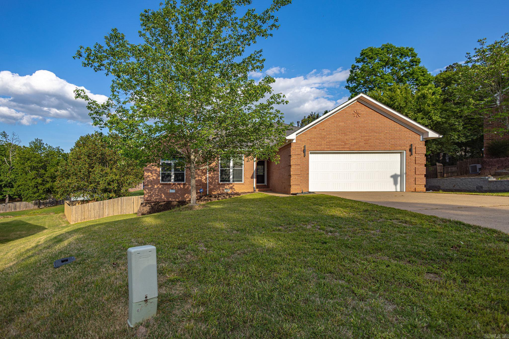 This Maumelle house offers 9 foot ceilings on a large 0.31 acre lot. The expansive backyard is a true highlight, featuring a 12x24 deck topped with a 10x13 gazebo. Large primary suite offers a jacuzzi style tub and a 50 gallon Hot water heater. Valuable upgrades for peace of mind include: Architectural Shingle roof March 2021 Fence with two on-site welded gates March 2023 Attic insulation March 2026 Tucked away on the end of a low traffic double cul-de-sac, makes this home offer a rare combination of privacy and location.