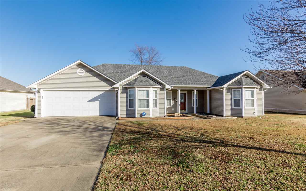 Spacious move-in ready home featuring 3 bedrooms, 2 baths, 1,666 sq ft +/- and located south of the bypass.  Inside amenities include:  awesome Quarts countertops, island with breakfast bar, hardwood flooring, cozy fireplace in the living room, formal dining room, 2 bay windows, jetted tub, large master walk-in closet and so much more.  Landscaped lot, privacy fenced backyard and outside building.  Call or text today for more information!