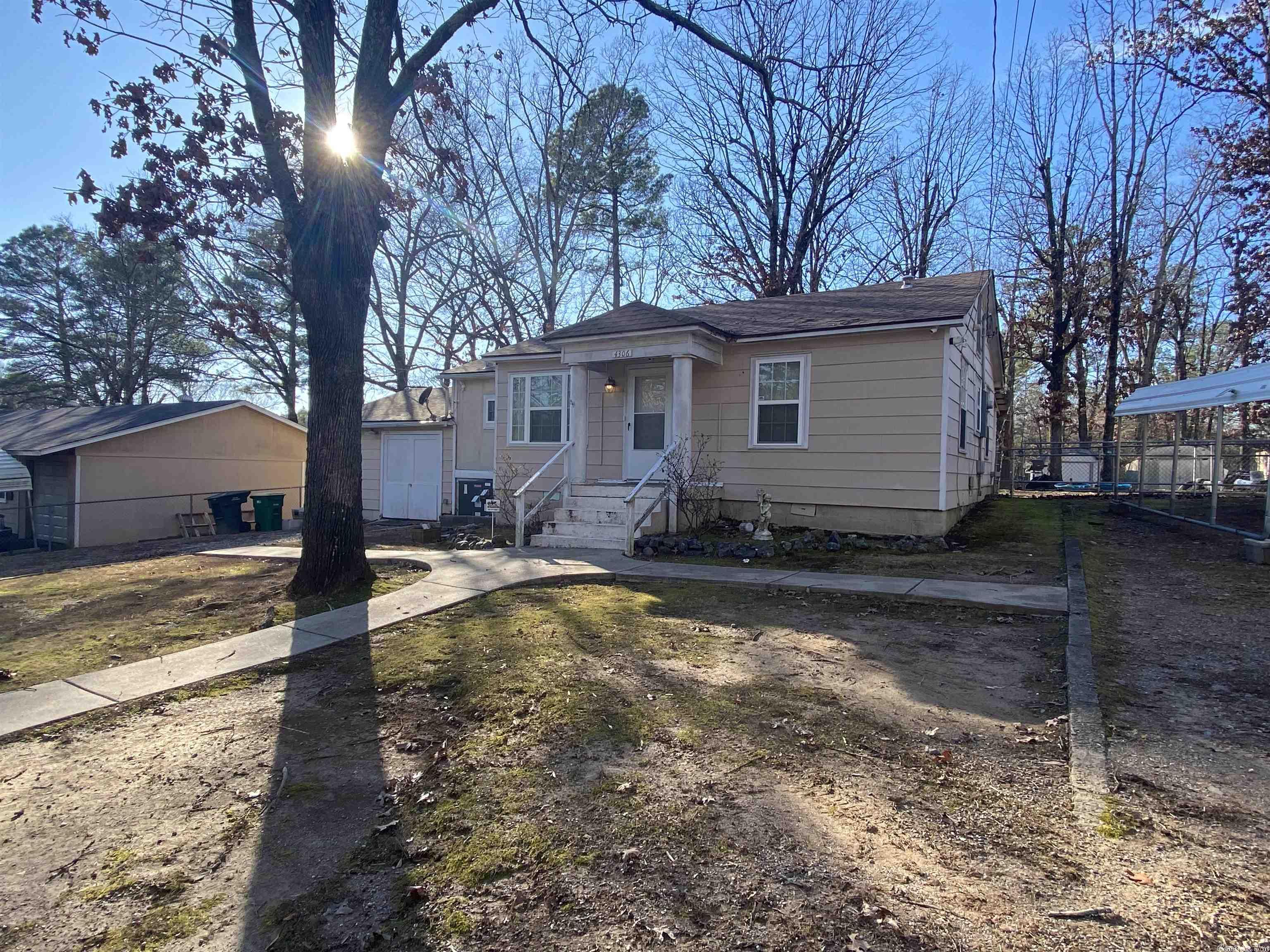 House comes with an extra lot and sits across the Kiwanis Park green space. Build a new house or use the extra lot for a shop or just extra space to do what you like. House to be sold as. HVAC 2019. Architectural shingled roof. A recent inspection report is available upon request. Agents see remarks.