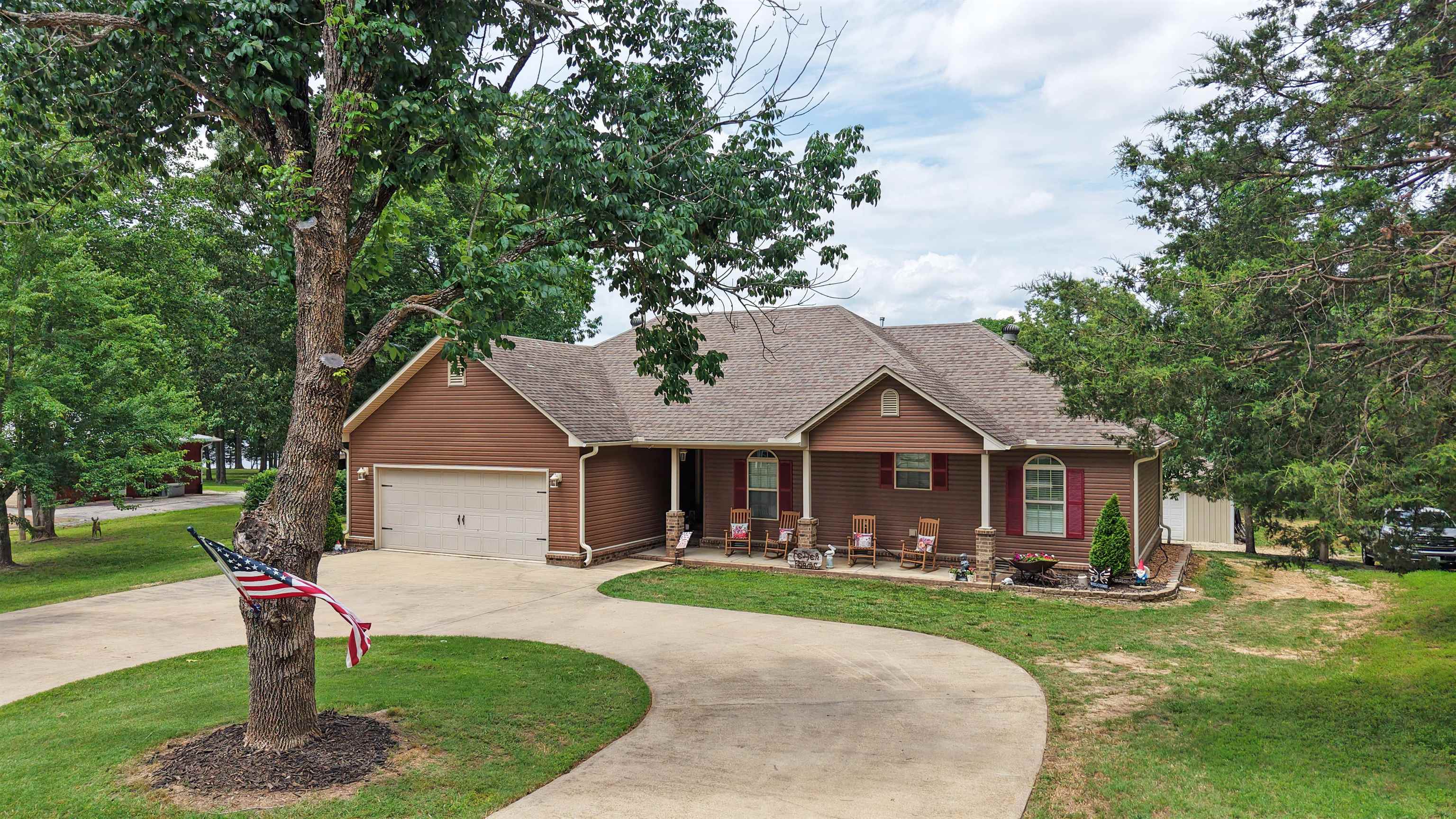 3 bedroom/ 2 Bathroom Lakefront Home in Pleasant Valley with Private Boat Ramp This 3 Bedroom/ 2 Bathroom Lakefront property located in the Pleasant Valley subdivision. The home was constructed in 2011 and underwent renovations in 2024. Interior features include custom cabinetry, a dedicated laundry room, and an interior storm shelter. The home is served by a concrete circle drive, allowing for convenient access, parking, and turnaround space. The layout supports everyday living with designated utility space and built-in storage through custom cabinet work. Exterior features include a privately owned boat ramp providing direct access to the water, as well as solar-powered dock lighting for added visibility at the shoreline. The property is positioned along the lake, offering consistent water access. The combination of original construction and recent updates provides a mix of established structure and updated interior elements. The property may be considered for use as a primary residence, secondary home, or seasonal occupancy.