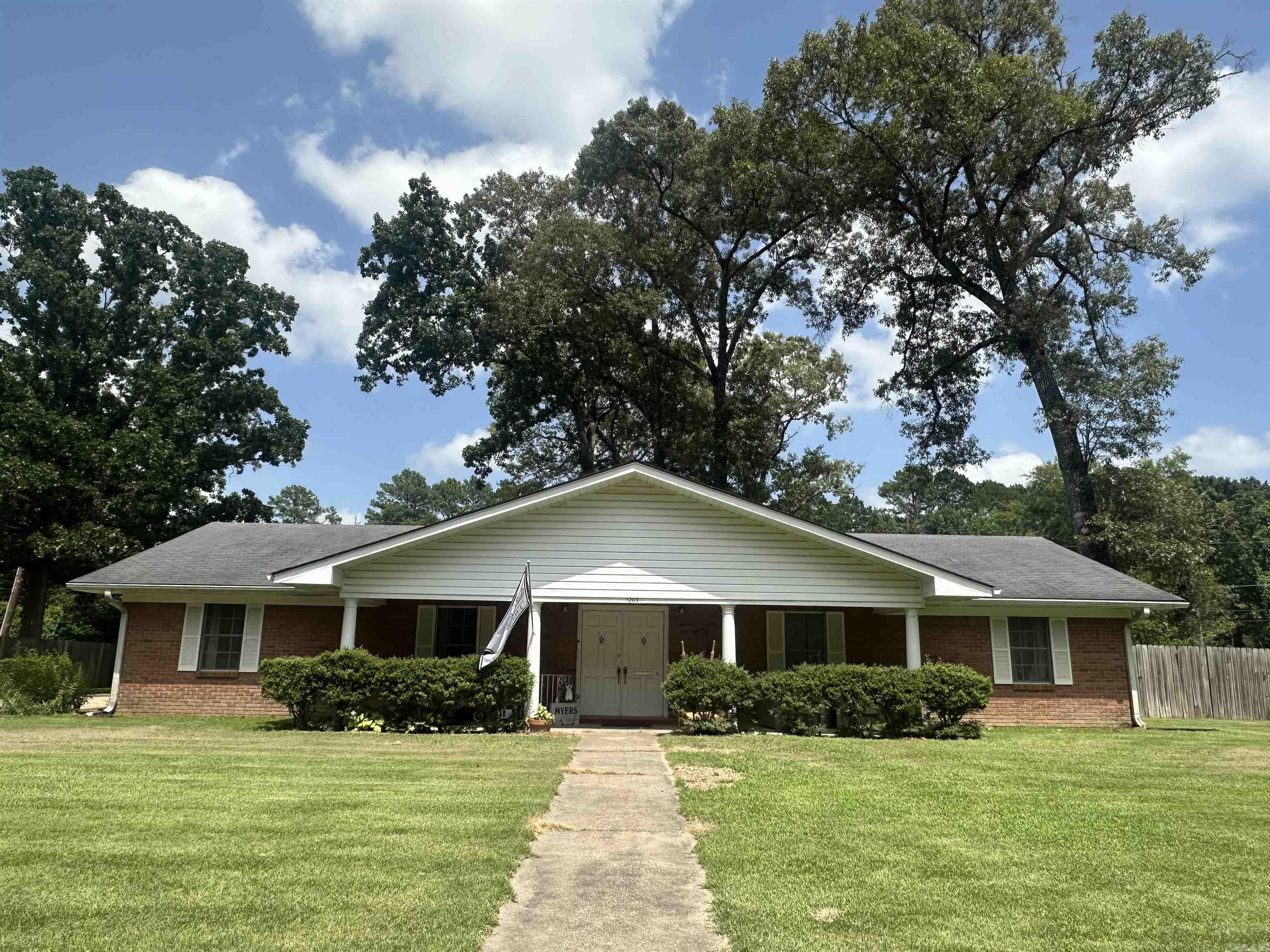 Welcome to 1203 Chestnut in Crossett! This well-maintained 3-bedroom, 2-bath home offers 1,964 square feet of comfortable living space in an unbeatable location—just seconds from the elementary school, which you can see right from the front lawn! You'll love the updated LVT flooring throughout the bedrooms, with matching LVT scheduled to be installed in the front living room prior to closing. The inviting double front doors create a warm first impression, while the spacious layout provides plenty of room for everyday living and entertaining. A large storage room off the two-car carport offers excellent space for storage, hobbies, or a workshop. Priced at $185,500, this home is ready for its next owners! **Interior Pictures coming SOON**