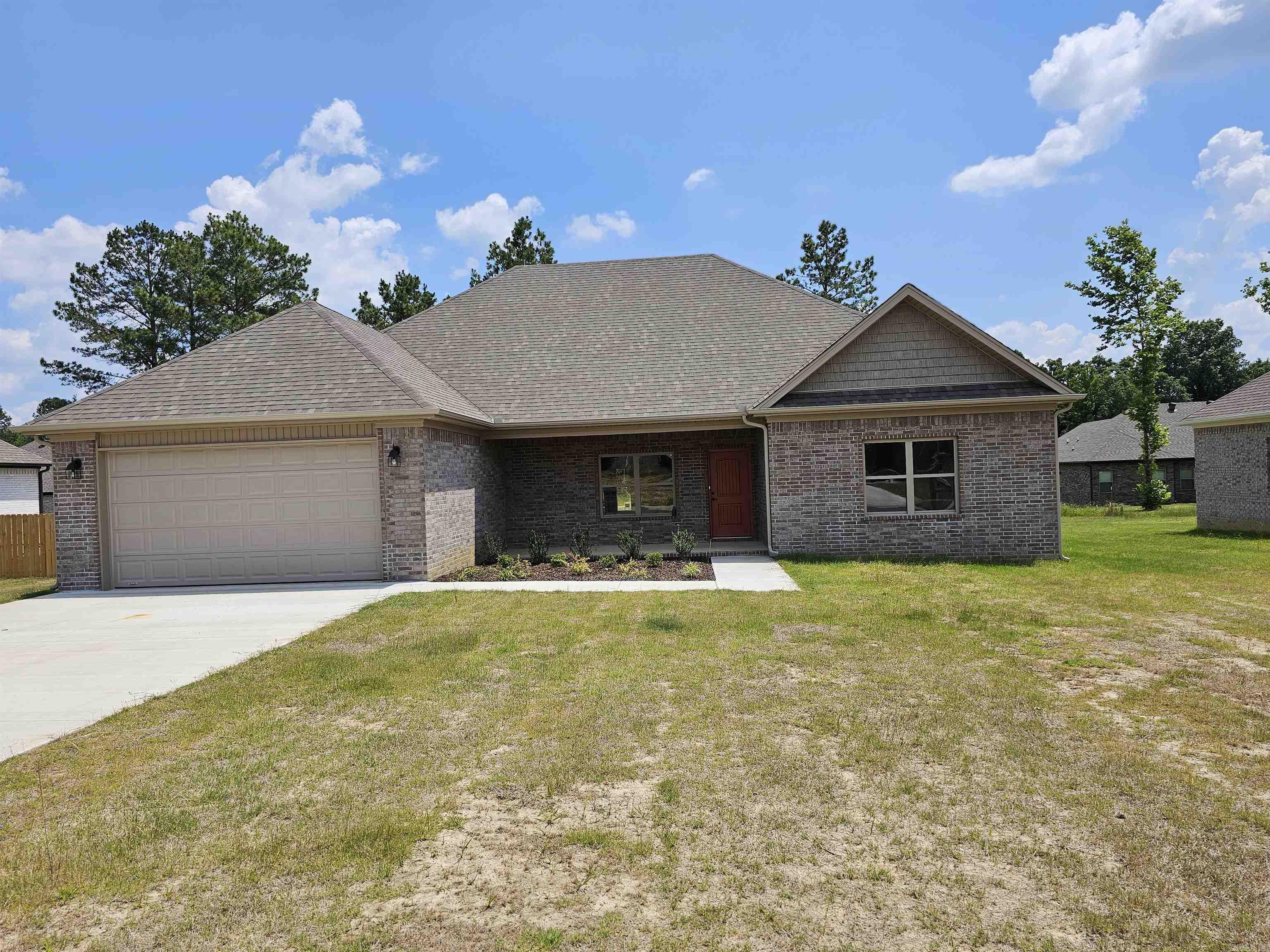 The builder is offering up to $8,000.00 in buyer concessions on this NEW CONSTRUCTION home!  This home is sure to please, an all brick home that features 4 Bedrooms/2 Baths, open floor plan with beautiful LVP flooring & modern electric fireplace! The kitchen is awesome with beautiful countertops and backsplash, large island with breakfast bar and HUGE walk-in pantry! The primary is split with HIS/HER vanities, soaker tub and separate shower! You'll LOVE the backyard with large, covered patio that is extended for entertaining! Great neighborhood with easy access to 67-167!