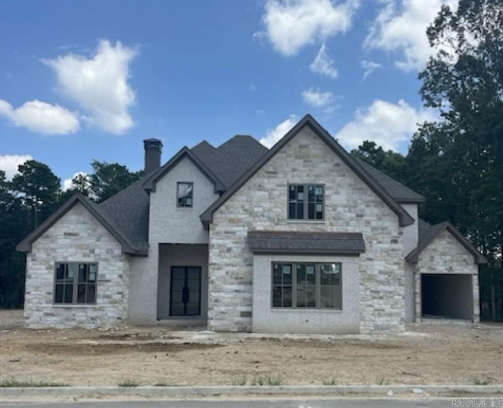 The good life doesn't just happen – you BUILD it in Miramont Circle! This gorgeous home at 67 Miramont Circle is under construction and will be ready to be called home within weeks! This 4-bedroom home features indoor and outdoor living spaces designed for entertaining. The oversized covered patio includes an outdoor kitchen and offers the perfect yard if a pool is one of your "must haves". The primary bedroom and one additional bedroom plus an office is on the first floor, with 2 additional bedrooms and a large media room upstairs. Miramont Circle is the last gated golf course neighborhood in Chenal Valley and offers beautiful surroundings and convenience to the very best of West Little Rock. Don't miss this opportunity to secure this home before completion!