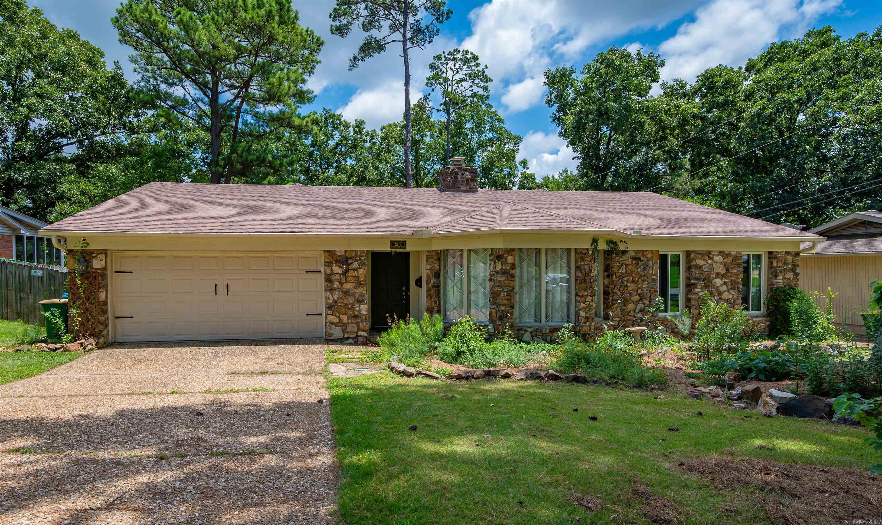 Welcome home to this move-in ready, one-level gem in the highly desirable Colony West neighborhood! Offering 3 spacious bedrooms, 2 full baths, and a flexible second living area perfect for a home office, playroom, or sitting room, this home is designed for comfortable everyday living. The inviting great room features gleaming hardwood floors, a stunning floor-to-ceiling rock fireplace, and an abundance of natural light streaming through oversized windows. Just beyond, the dining area flows seamlessly into the kitchen, which offers a functional semi-open layout ideal for entertaining. The private primary suite is thoughtfully separated from the secondary bedrooms and includes its own full bath. Two additional bedrooms share a well-appointed hall bath. Step outside to enjoy the large screened-in porch and covered deck overlooking the spacious backyard—perfect for relaxing or hosting family and friends. Conveniently located near the neighborhood park (tennis & basketball) and pool, this home combines comfort, convenience, and a fantastic location. Schedule your private showing today!