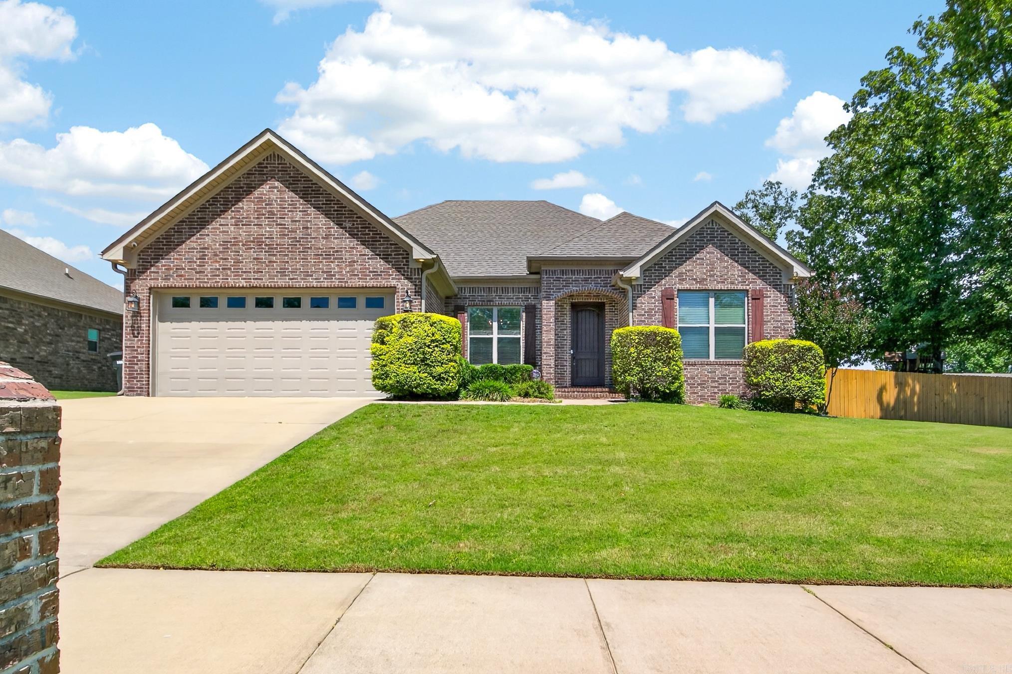 This home features 2243 sq ft open floor plan. Hardwood flooring, Large living w/fireplace, Kitchen w/granite, stainless steel, breakfast bar & a large walk in pantry. Large master w/tray ceiling, master bath has double vanity, sep shower, garden tub, huge walk in closet which goes thru to the large laundry. Covered patio with another patio attached and a deck. Two car garage w/extra parking pad on the side. No smoking/vaping. No more than two (2) pets permitted; all pets require prior approval and are subject to applicable restrictions and fees. Application/background screening; security deposit and renter’s insurance are required prior to occupancy.  Scheduling showings starting 5/22/26.