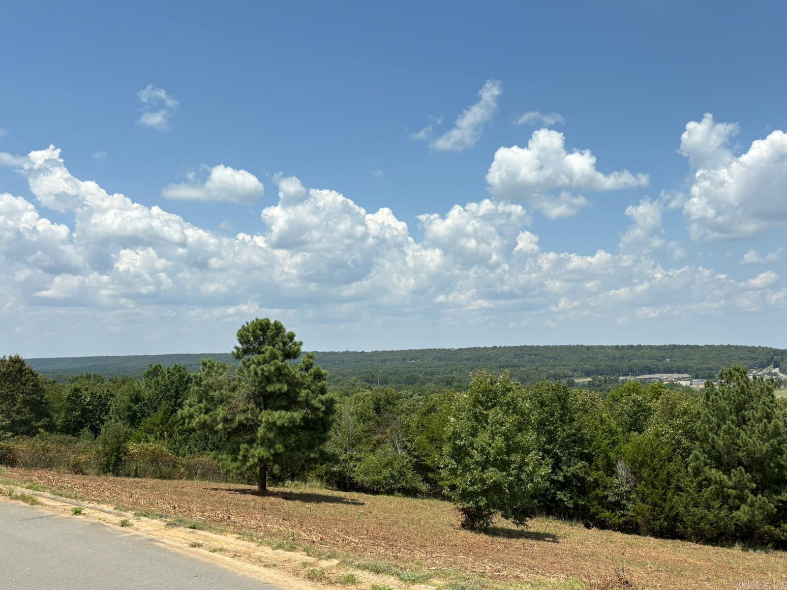 Exceptional opportunity to build in a prestigious subdivision! This spacious lot offers breathtaking panoramic views and is nestled in a premier neighborhood where every existing home is a luxury, custom-built masterpiece sitting on large lots. Min 2700 sq ft heated and cooled. Bring your vision and create the home you’ve always dreamed of in one of the area’s most desirable communities. More photos coming soon.
