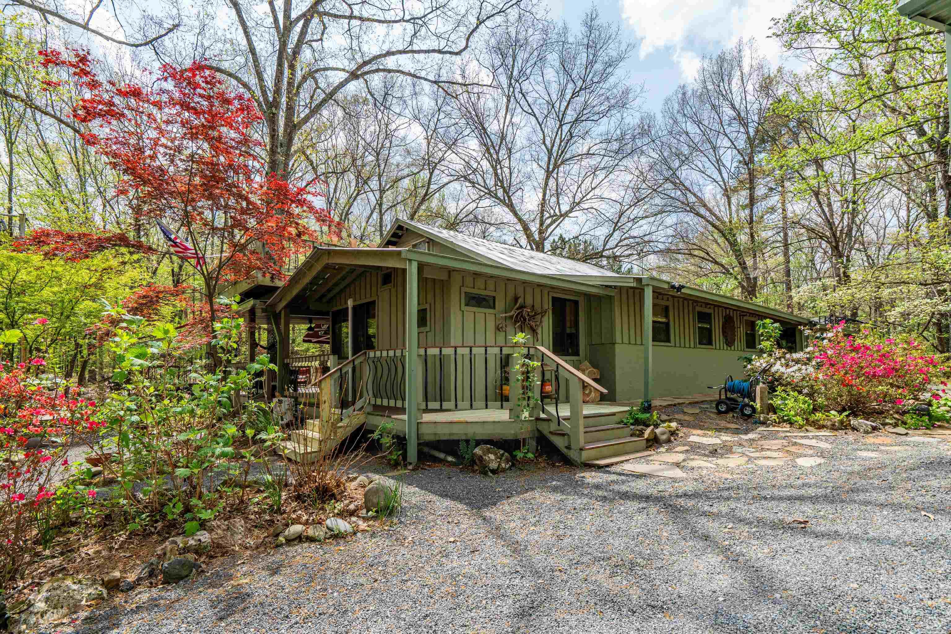 Private Retreat near Lake Ouachita. Situated on approximately 15 secluded acres and bordered by National Forest, this property offers unmatched privacy, peaceful surroundings, abundant wildlife for the outdoorsman, abundant hardwood timber, and natural creeks -perfect for those seeking a true escape to nature. The main home features 2 bedrooms and 2 bathrooms, offering a comfortable and functional layout with plenty of room for entertaining. A greenhouse provides space for year-round gardening, while the workshop and garage give you plenty of room for storage, projects, boat storage, or outdoor gear. In the garage, you’ll find a 1 bedroom, 1 bathroom apartment - ideal for guests, or a private getaway. Located just 6 miles from multiple Lake Ouachita resorts, you’ll enjoy quick access to boating, fishing, and recreation while still having the seclusion you crave. Whether you’re looking for a full-time residence, weekend getaway, or investment opportunity, this property checks all the boxes.