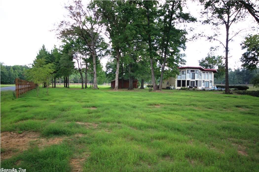This is a charming  get away - a great spot with gorgeous views of land and pool.  Large master with a great master bath - Lots of glass and sunlight!  Updated kitchen, loft/ second bedroom  -   16+ acres can be divided  - storage barn/ see mls # 10368429    house and 5    adjoins
