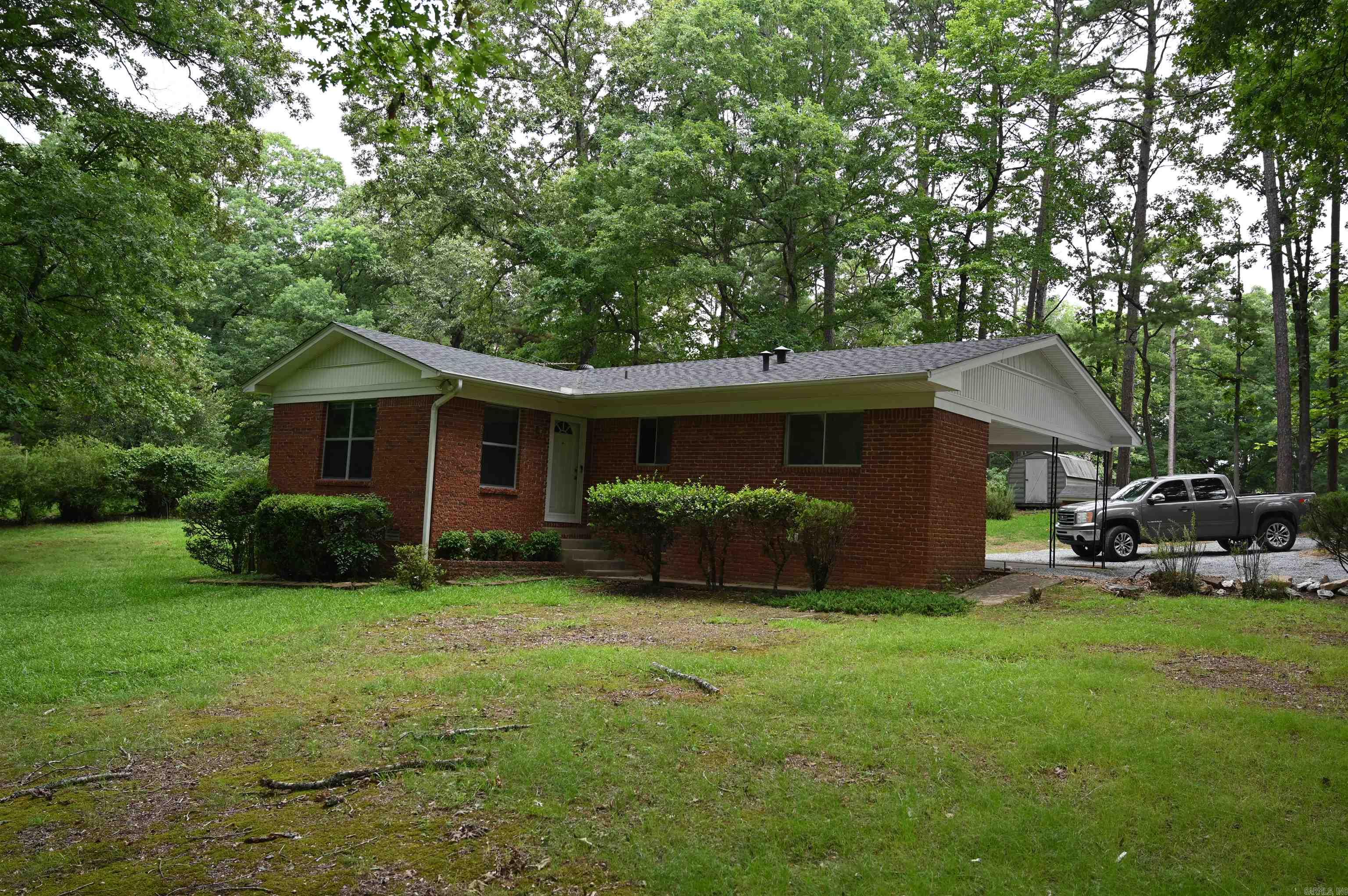 Welcome to 3915 McGee Road in Benton! Situated on approximately 2.32 acres at the corner of Hot Springs Highway and McGee Road, this well-maintained brick home offers the perfect blend of country charm and everyday convenience. Featuring 3 bedrooms, 1.5 bathrooms with new flooring, and approximately 1,472 square feet, the home has been lovingly cared for and is move n ready. Inside, you'll find a spacious living area, comfortable bedrooms, and a functional floor plan designed for easy living. The eat in kitchen provides plenty of cabinet space and is ready for your personal touch new dishwasher and disposal, Refrigerator transfers. Laundry room remodeled with new insulation and sheet rock.  Outside, the mostly cleared acreage is accented by mature trees, offering room to garden, play, or simply enjoy the peaceful surroundings. Whether you're looking for your first home, a place to downsize, or a property with space to make your own, this home offers endless potential in a convenient Benton location just minutes from shopping, dining, schools, and Interstate 30. Don't miss this opportunity to enjoy country-style living with easy access to town!