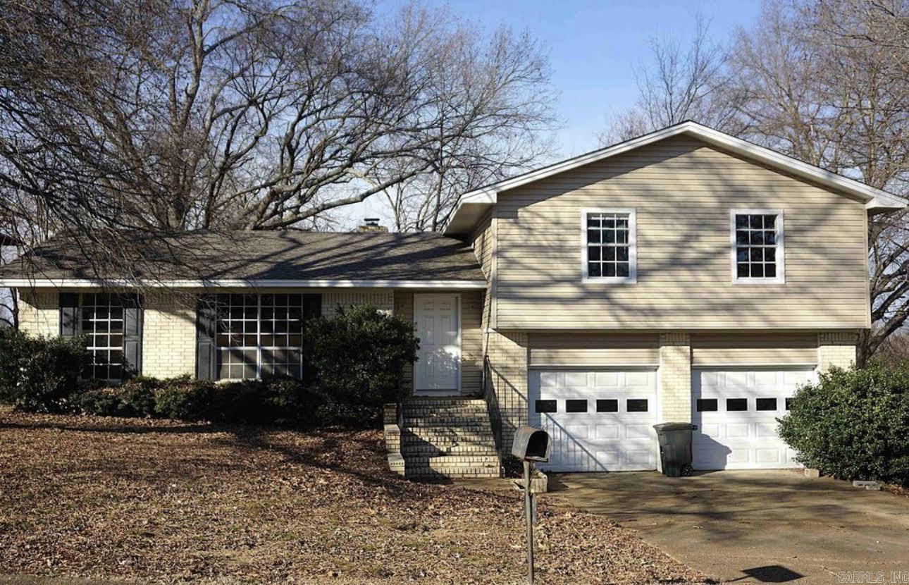 Welcome to 12 Blue Ridge Dr! Located in a desirable, established neighborhood, this beautifully updated 3-bedroom, 2.5-bath home offers the perfect blend of character, space, and modern updates. Featuring gorgeous hardwood floors throughout the main level, this home includes a formal living room, formal dining area, and a cozy den with a wood-burning fireplace.  The updated kitchen showcases stylish quartz countertops, plenty of cabinet space, and a functional layout perfect for everyday living or entertaining.  One of the standout features is the incredible double back deck—perfect for relaxing, entertaining, or enjoying the large backyard. A heated and cooled craft room or office adds flexible space for hobbies, working from home, or a private retreat.  With updated finishes throughout, this home is move-in ready and packed with charm, functionality, and space to enjoy inside and out!