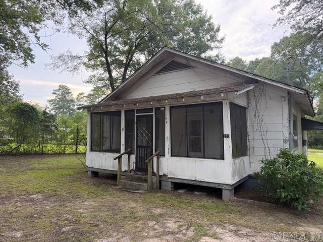 Welcome 210 W. 14th St. — The Perfect Fixer Upper. Situated on approximately 0.74 acres within the Smackover School District, this 2-bedroom, 1-bath home is full of potential for investors, renovators, or buyers looking to create their dream home. A renovation completed in 2014 included new windows, updated flooring, installation of a tankless hot water heater, walk-in shower and updated electrical wiring, providing a solid foundation for future improvements. Whether you're looking for your next investment project or a home with room to make it your own, this property offers endless possibilities. Kitchen Appliances include: dishwasher, gas cook-top, Single wall oven-electric & refrigerator.