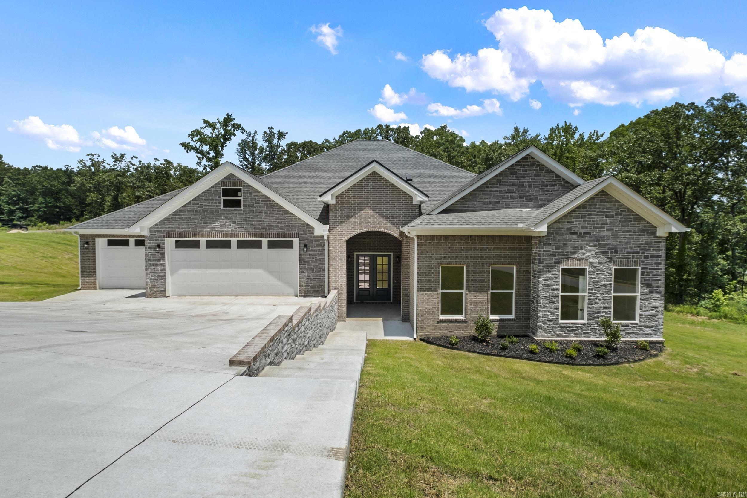 Welcome to this stunning new construction home on a half an acre in the highly sought-after Creekside Subdivision in Sherwood! This spacious 5-bedroom, 3.5-bathroom home offers an open-concept floor plan, ideal for modern living and entertaining. With generous square footage, each room is thoughtfully designed to maximize comfort and style. The master suite features a luxurious ensuite bathroom and walk-in closet, while the additional bedrooms provide ample space for family, guests, or a home office.  The Creekside Subdivision offers a peaceful, family-friendly environment with easy access to local parks, schools, and shopping. Whether you’re relaxing at home or exploring the neighborhood, this location provides the perfect blend of convenience and tranquility.  Don’t miss the chance to make this brand-new home yours—schedule a tour today!