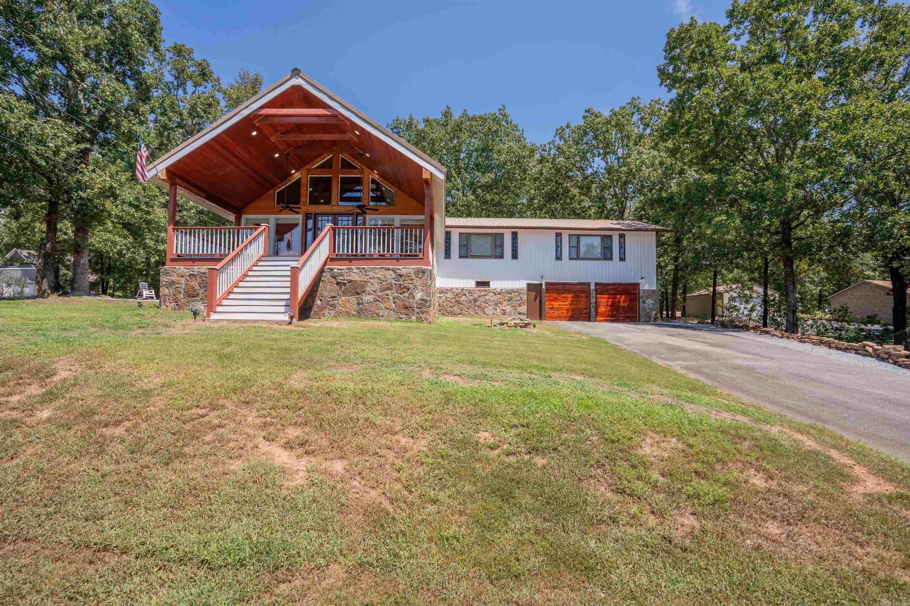 Stunning 5-Bedroom Home with Multiple Living Areas and Panoramic Lake Views This beautifully maintained 5-bedroom, 2.5-bath home offering exceptional comfort, versatility, and breathtaking lake views. Designed for both relaxation and entertainment, this spacious residence features multiple living spaces, providing plenty of room for gatherings, quiet retreats, or multi-generational living. Step inside to find a bright, open layout with large windows that capture the beauty of the surrounding landscape. Each bedroom is generously sized, while the primary suite offers added privacy and comfort. Outdoors, enjoy serene mornings and picturesque sunsets from the large front porch, perfect for relaxing with a cup of coffee or entertaining with a view. The property also includes ample storage, an RV hookup, and plenty of space for hobbies, tools, or recreational equipment. With its inviting charm, thoughtful features, and unmatched lake scenery, this home provides the perfect mix of functionality and tranquility. Don’t miss the chance to make this exceptional property your own!