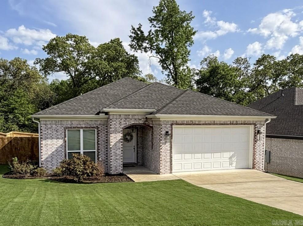 Welcome to this beautifully maintained all-brick home in the highly sought-after Village East subdivision, where comfort, style, and convenience come together effortlessly. Built just 4 years ago, this thoughtfully designed 3-bedroom, 2 bath home offers a bright, open-concept layout with soaring ceilings and abundant natural light. The main living spaces feature durable wood-look tile flooring throughout, completely carpet-free for a clean, modern feel. The kitchen is both functional and elegant featuring quartz countertops, a spacious pantry, and a large bar area perfect for casual dining or entertaining. A separate dining space or flex room provides the ideal setup for a home office, formal dining area, or additional living space. Enjoy quiet mornings or relaxing evenings on the large covered back porch overlooking a fully fenced backyard complete with mature trees for added privacy, an ideal retreat right at home. Additional highlights include: - Refrigerator, washer, and dryer - Spacious primary suite with well-appointed bathroom - Modern finishes throughout - Located minutes from major highway, offering easy access to LR & LRAFB - Well maintained neighborhood