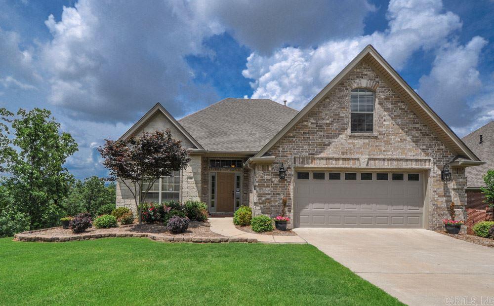 Gorgeous home with a breathtaking view of Pinnacle Mountain.  5 BR/4 full BA + Bonus. Open Kitchen with stainless appliances & island.  Large Master with walk through closet & two BR on main level. Bonus up, In Law Quarters.  Hardwoods, carpet, Tile.  Upper deck and lower covered patio with fenced in yard. Tank less WH, AC unit downstairs 2014, Roof 2009, Indoor Storm shelter on bottom floor.  Walk in crawl space w/floored storage area. HAS IT ALL!!  Brick Exterior w/ Large interior.   See agent remarks.