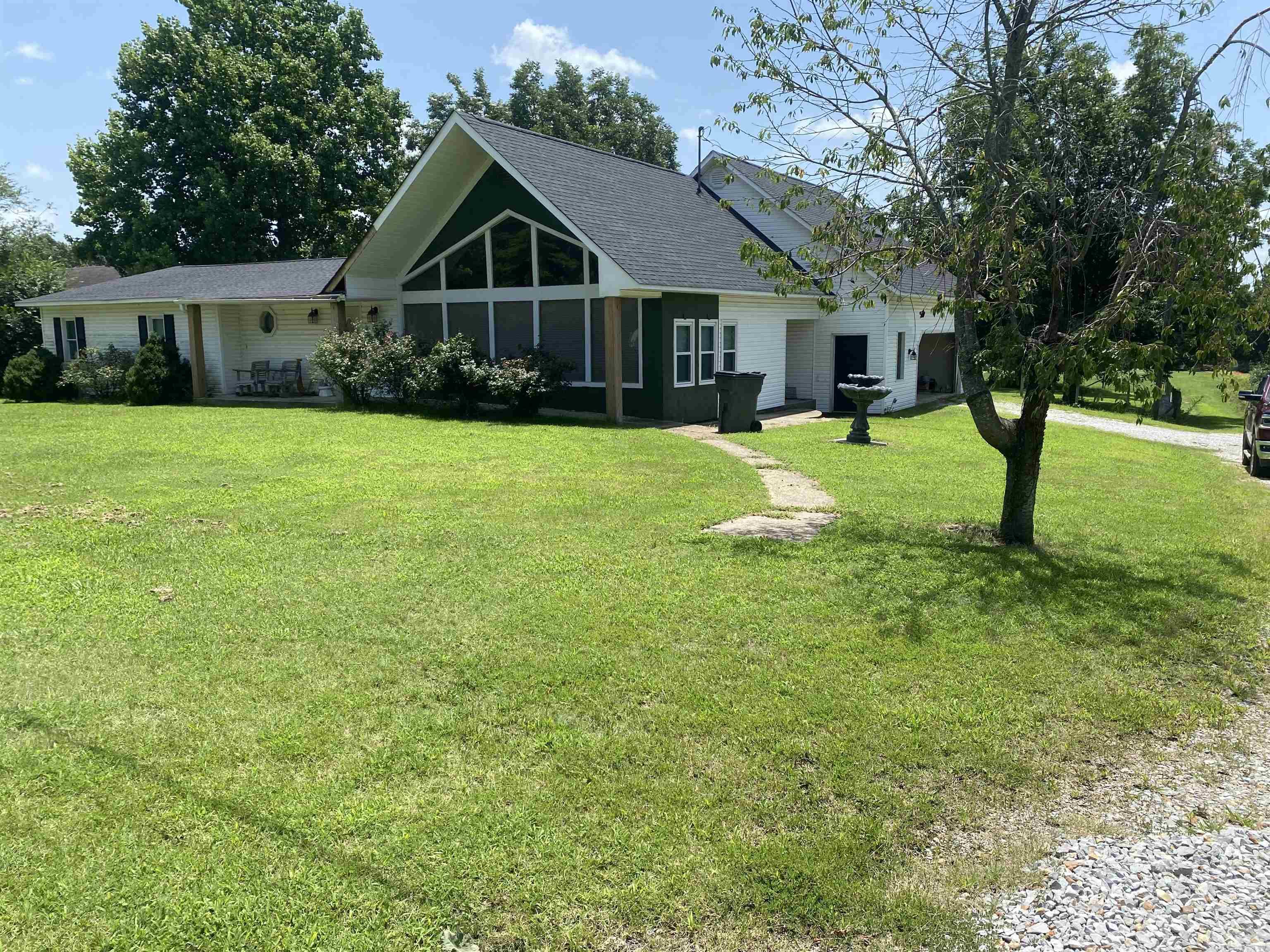 Three bedroom two bath with 1878 SQ FT on 1.58 acres +/-. 2 car garage. Enjoy the comfort of a three year old roof and a two year old HVAC unit, all packed in with easy access to the center of town.
