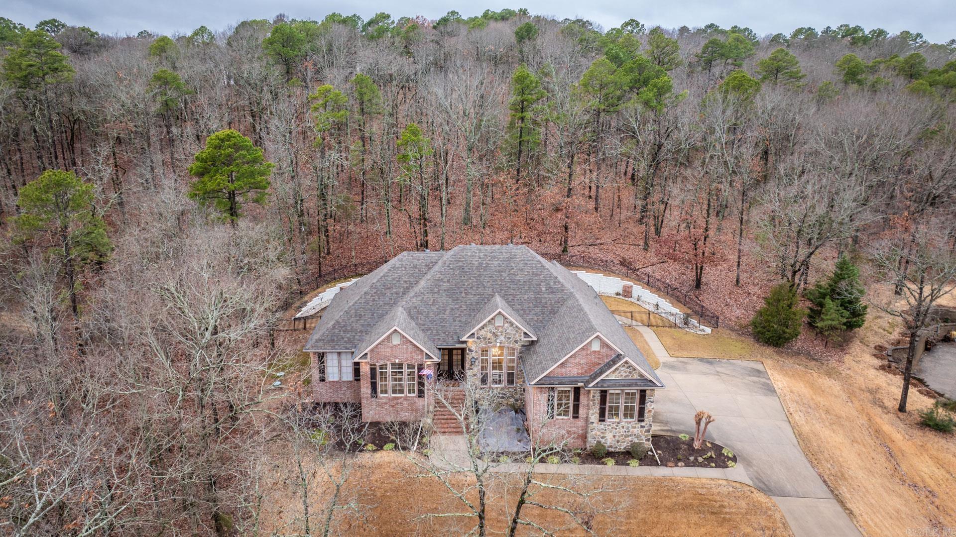 BOMK to no fault of the seller or this amazing home! Look no farther! This incredible home is nestled in the desired neighborhood, Cresthaven. Easy access to the interstate to commute to Little Rock or surrounding communities. Upon entering the home, you are welcomed into rooms with high beamed ceilings which add perfect charm. Enjoy your coffee or hot cocoa by the fire in the hearth room or around the fire pit in the back yard. This move-in ready split floor plan has been completely updated; New paint inside and out, quartz counter tops throughout, backsplash, 6 burner gas stove, dishwasher, fixtures, fans, toilets, glass for shower, carpet, electrical switches and plates, nest thermostats and wine fridge in bonus room. It includes a new roof, gutters, sprinkler system, landscaping, and many new windows. Wired with 240V AC 50 amp for hot tub. The new hot tub is negotiable. The private back yard is perfect to add a pool if desired. The upstairs bonus/media room, with private bathroom, could be a 5th bedroom if desired. This home is also now smart capable and is on Conway Corporation Utilities! Pictures coming soon!