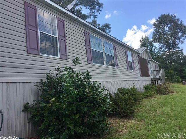 Three bedroom, 2 bath manufactured home for rent. This home sits on a hill overlooking a pond with a beautiful view. Spacious living area with open floor plan. Large kitchen island with lots of storage. Fireplace, office space, garage and much more!