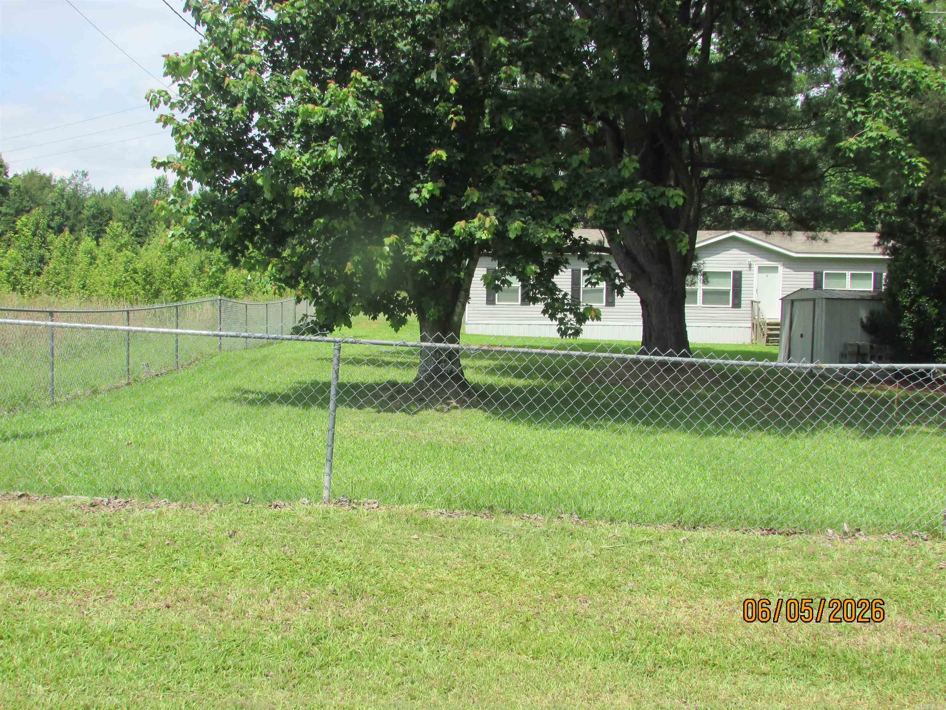 Looking for privacy and a place for your horses or livestock? This is it! Located between Cabot and Jacksonville. This home features a split floor plan with 2 living areas. Nice size primary bedroom and bathroom has a separate shower and garden tub. Open kitchen and dining with a breakfast bar. Relax on the deck and enjoy nature. The property is almost completely fenced. **Horse corrals do not convey.**  Won't last long.