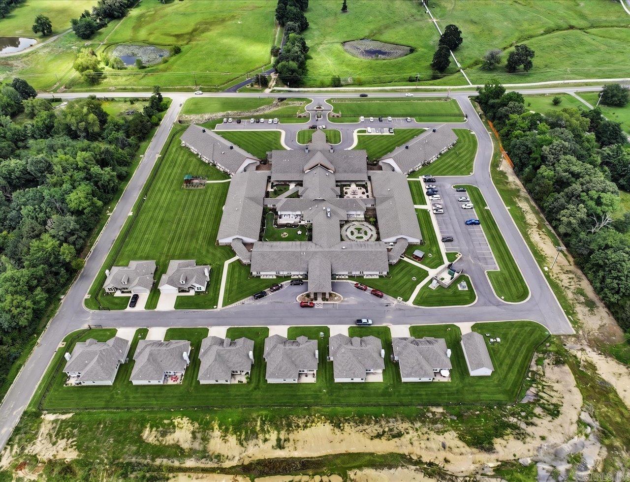 Exceptional commercial opportunity featuring an approximately 72,000 +/- square foot assisted living facility situated on 20 +/- acres with approximately 500 +/- feet of road frontage. This expansive property offers an impressive building footprint, generous acreage, and excellent visibility. The combination of a large facility, abundant land, and significant road frontage creates an outstanding commercial investment opportunity. Ample outdoor space provides additional flexibility for future improvements or expansion. Contact the listing agent for additional information or to schedule a private tour.