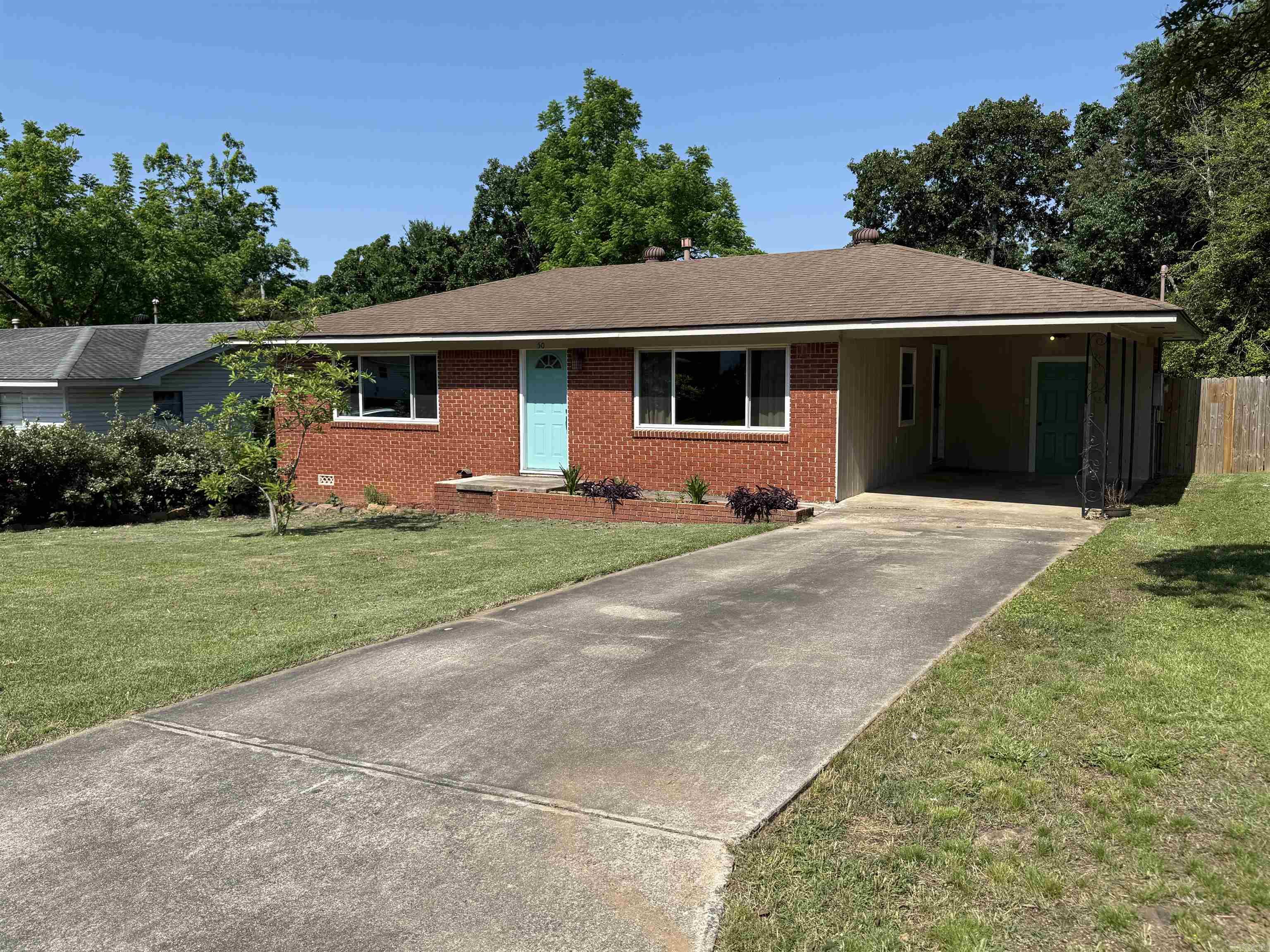 Totally remodeled home in the heart of Sherwood.  3 bedrooms, 2 baths, large den with a picture window for lots of natural light.  Beautifully refinished original wood floors. Updated kitchen with granite counter tops and newer appliances.  Covered patio perfect for outdoor living. Heated and cooled bonus room/flex room with ethernet not included in the square footage could be a great office, studio, play room or partial mother-in-law quarters. New windows, fully fenced yard, and a one car carport make this home a must have!