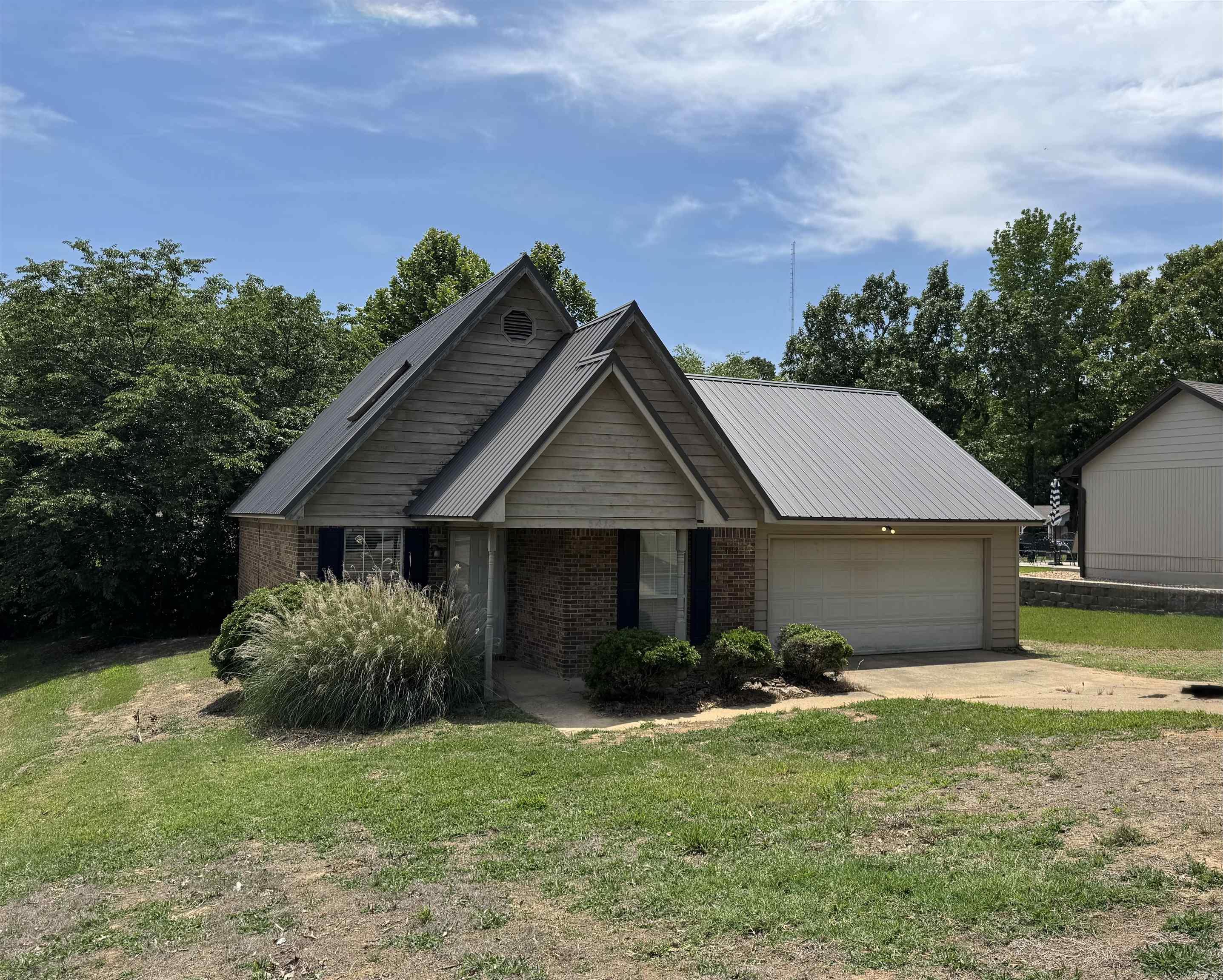 Two story bungalow with a new metal roof in Valley View school district