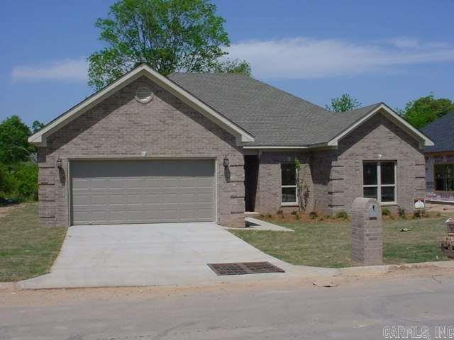 Location, location, location !!!! Beautiful low maintenance home in a subdivision located minutes from downtown Little Rock. Fully landscaped, level lot . Open,split bedroom floor plan:: very large great room with built-in entertainment center & Fireplace, 3BR, 2BA, 2 car garage.Large modem kitchen with island and upgraded stainless steel appliances. Master suite w/trey ceiling, large BR w/whirlpool tub, separate shower, double sink vanity, & his/her walk-in closets