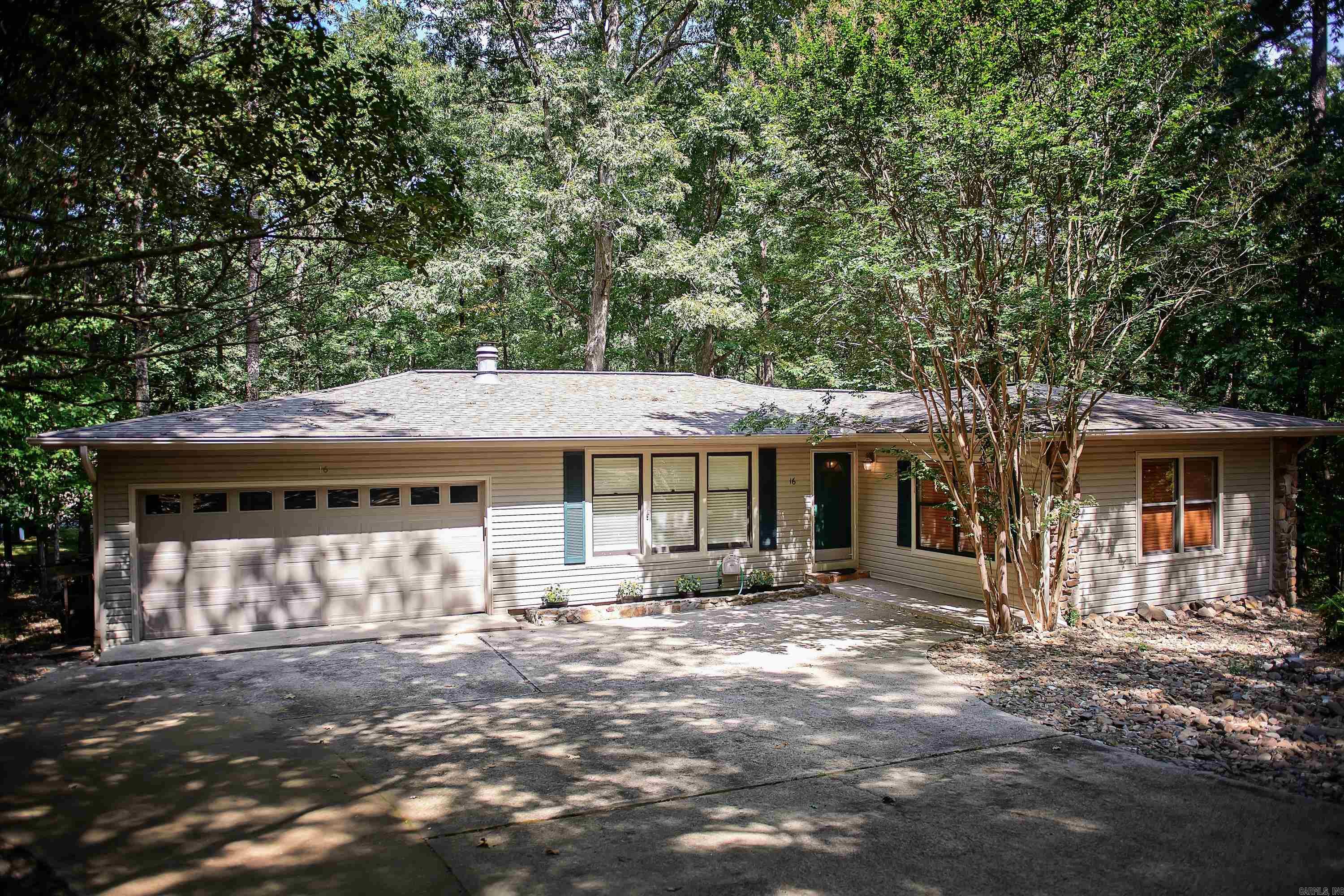 Adorable UPDATED 2 bedroom 2 bath. Walking distance to Desoto Lake and Golf Course trails. This home has a very private setting with an abundance of wildlife to watch from your screened in porch. BRAND NEW HVAC includes new duct work, new insulation, a/c unit and furnace. With many updates throughout this home is sure to impress.